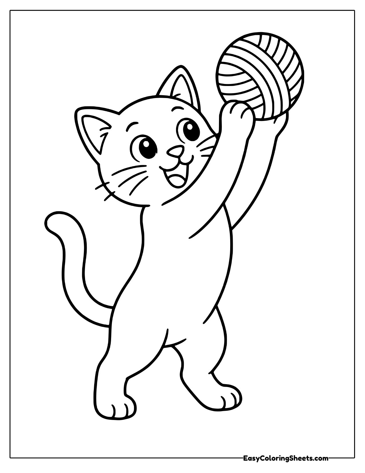 Kitten holding a ball of yarn overhead