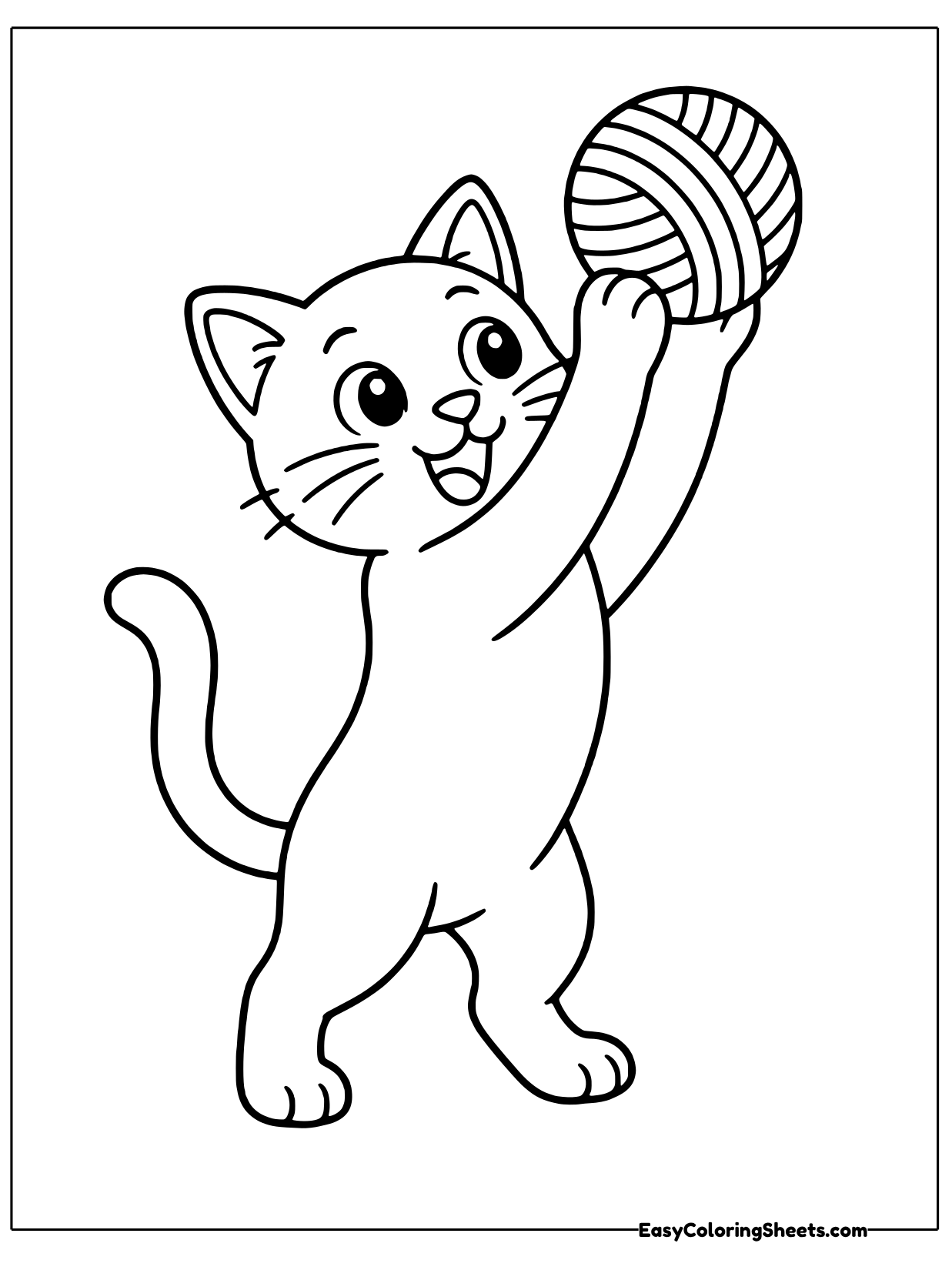 A cheerful kitten stands on its back legs and lifts a ball of yarn up above its head with one paw.