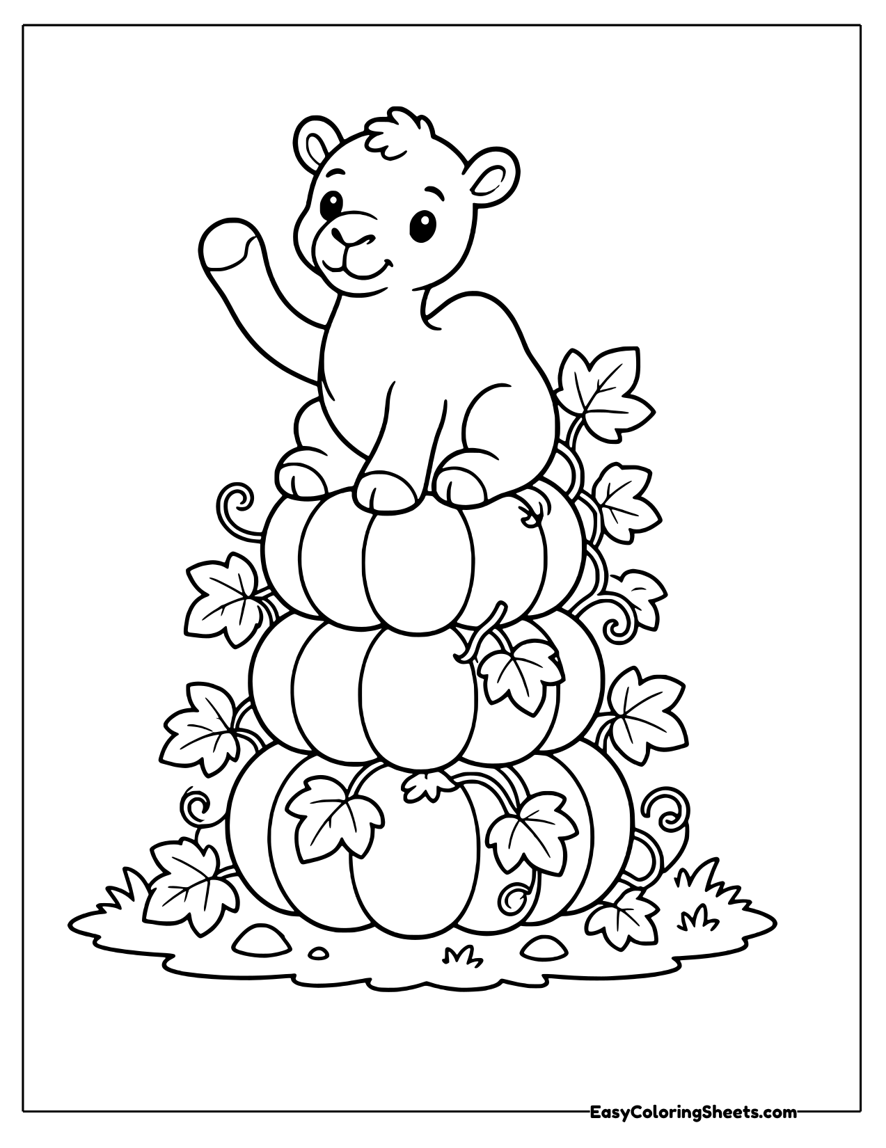 Camel sitting on stacked pumpkins