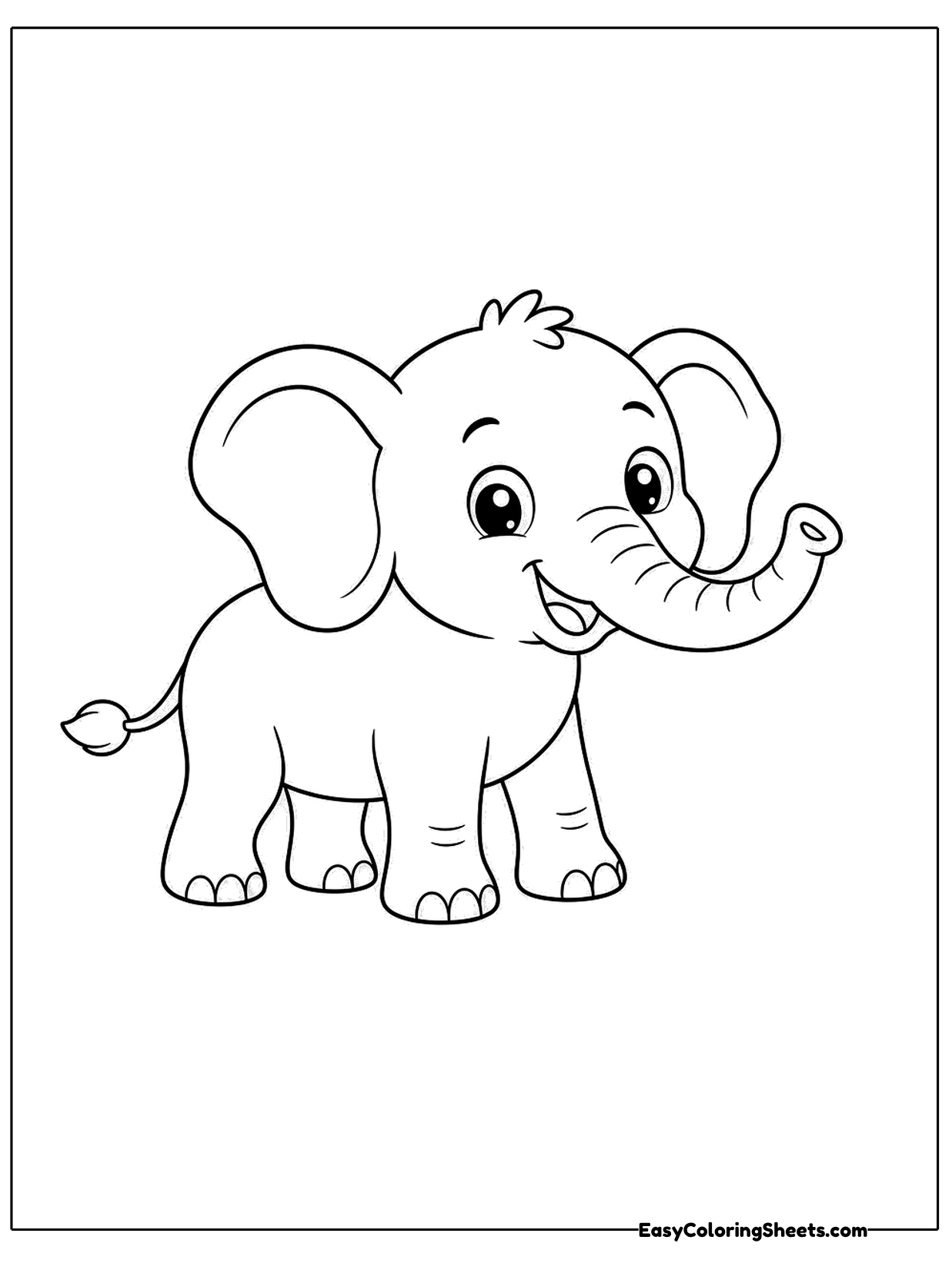 A cute elephant stands sideways with its trunk hanging down and its little tail curled.