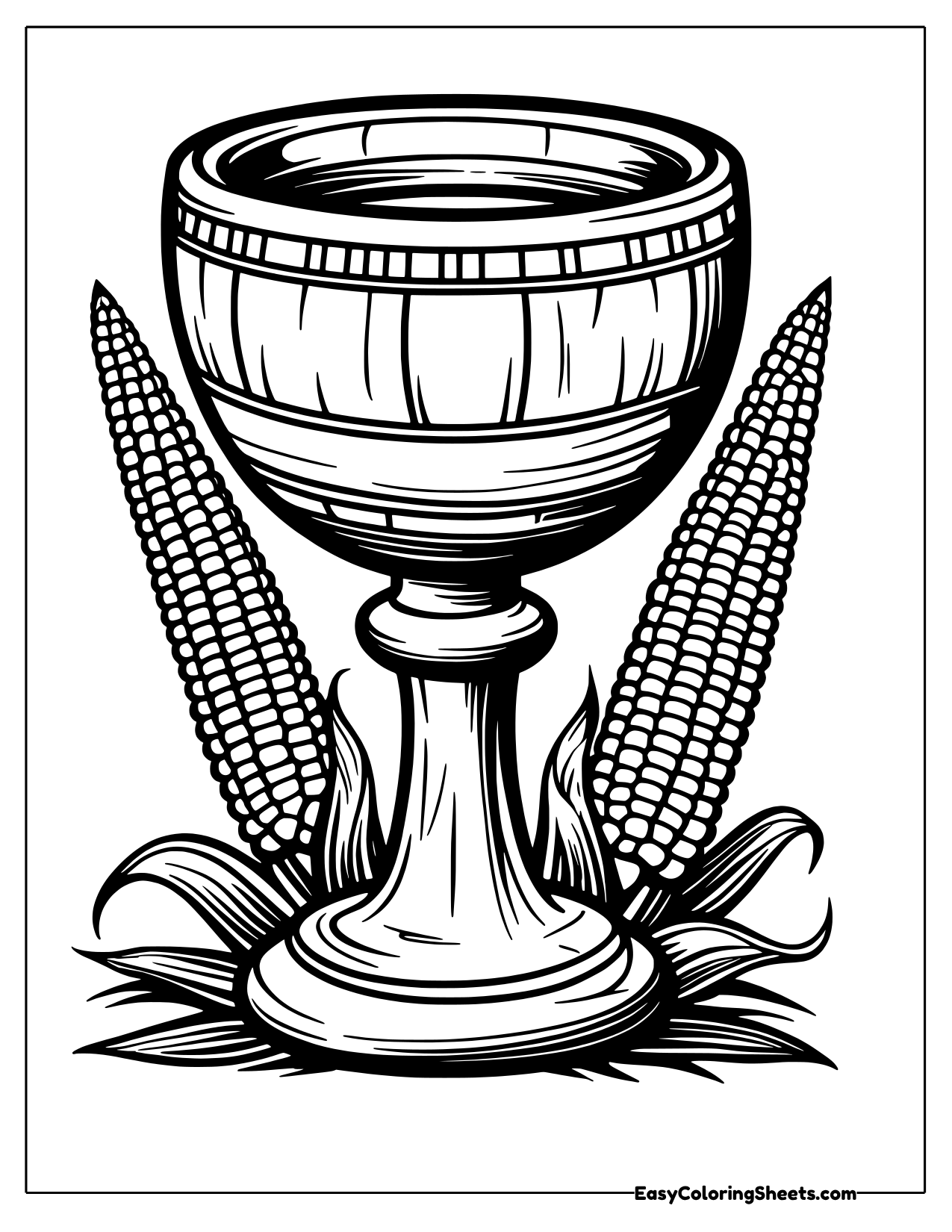 Carved wooden unity cup standing between two ears of corn on leaves