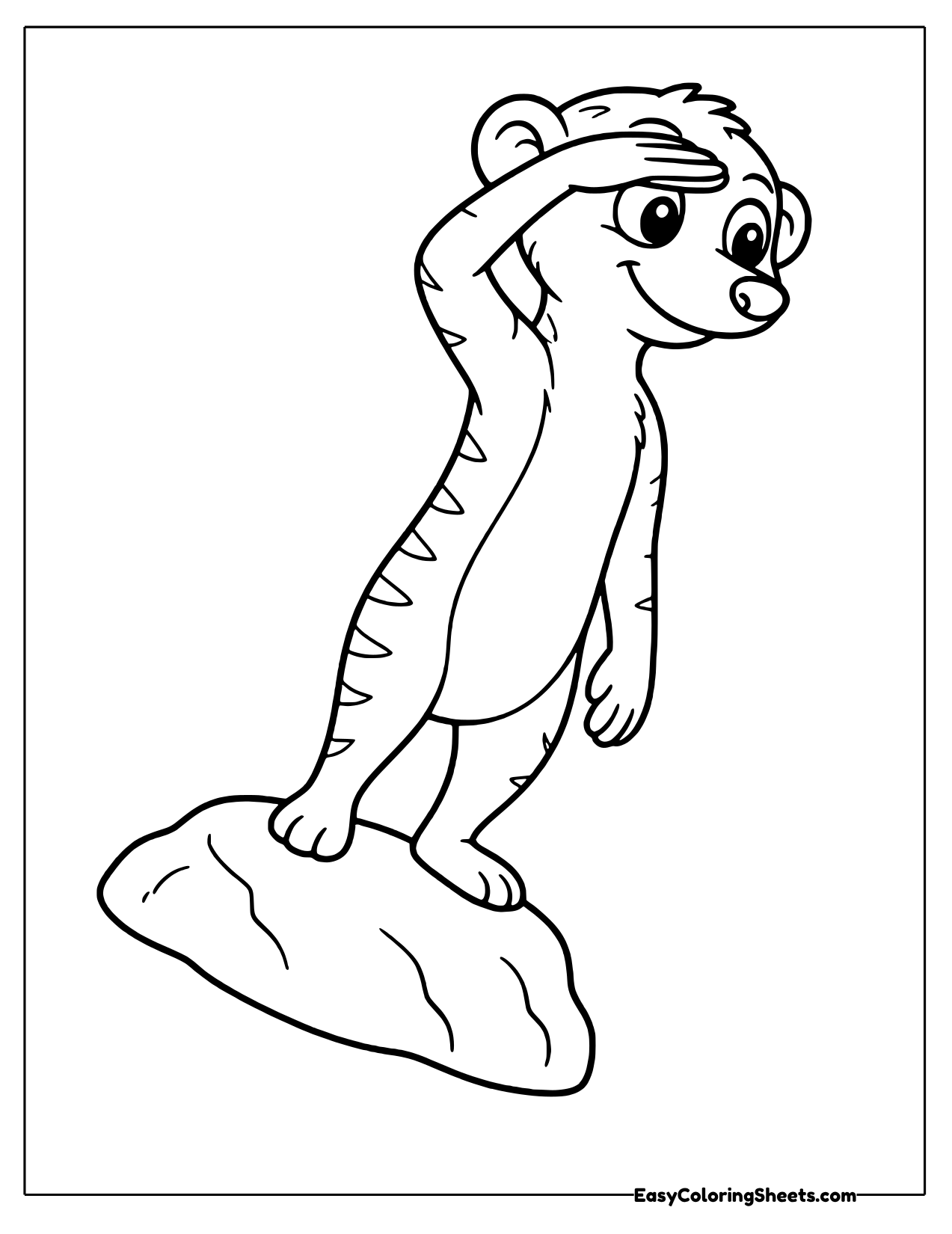 Meerkat shading its eyes on a rock
