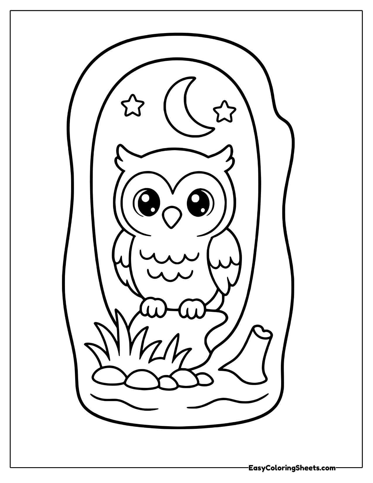 Owl sitting in a hollow tree