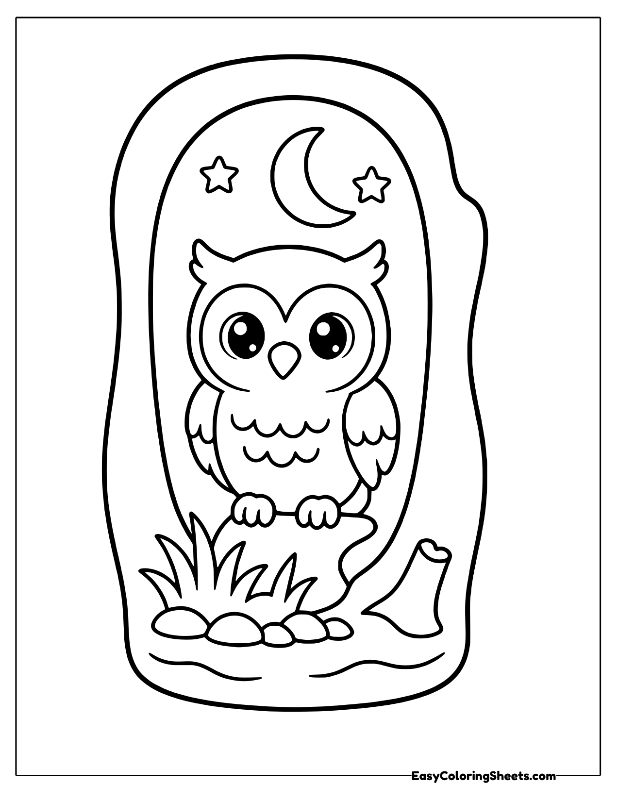 Owl sitting in a hollow tree