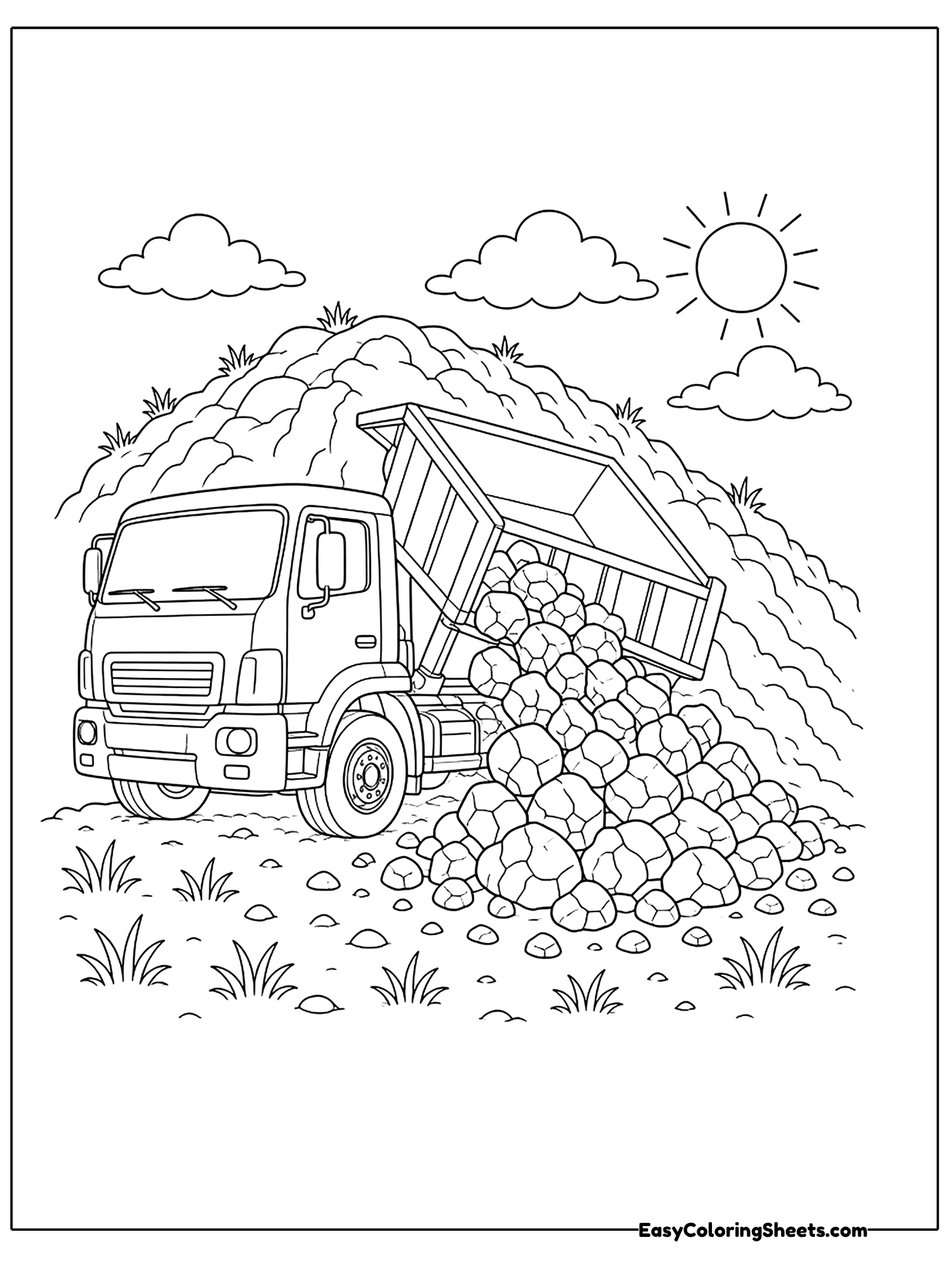 A dump truck unloads a big pile of rocks beside a dirt road with hills and the sun in the background.