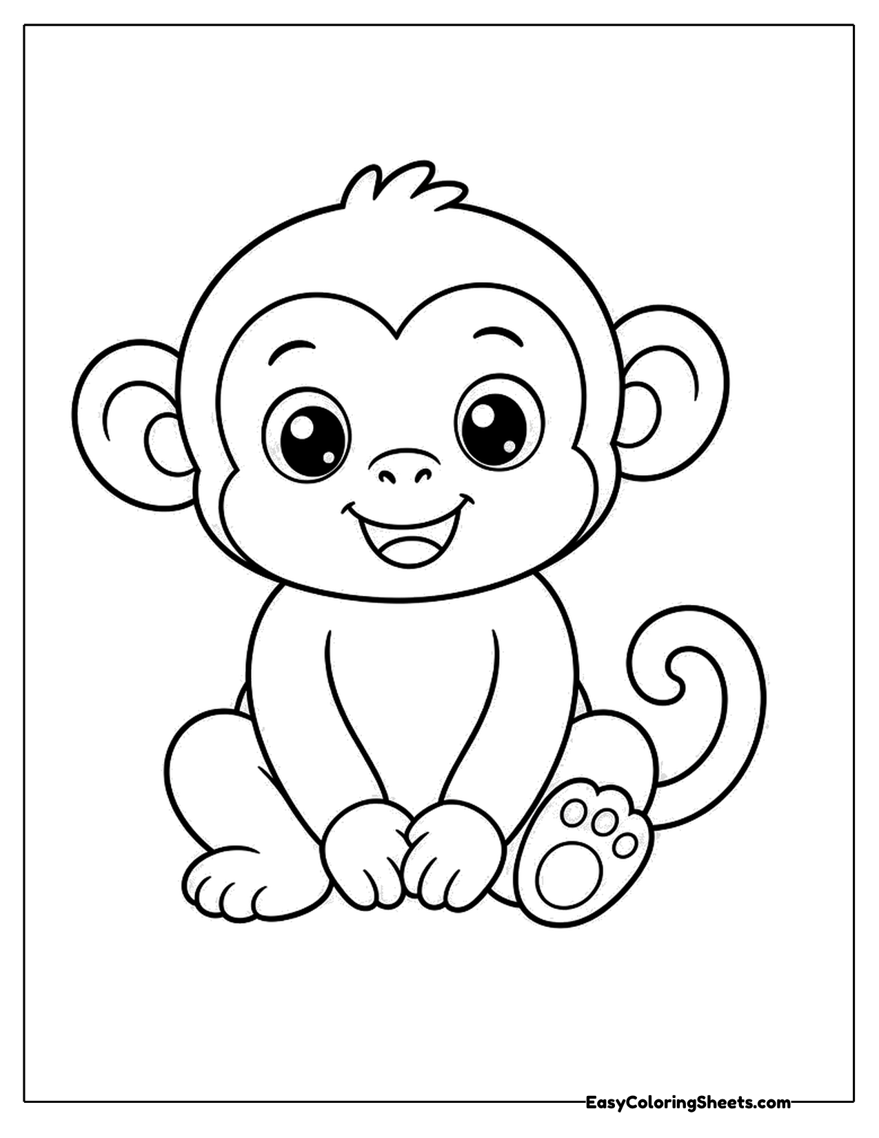 Cute baby monkey sitting with a curly tail