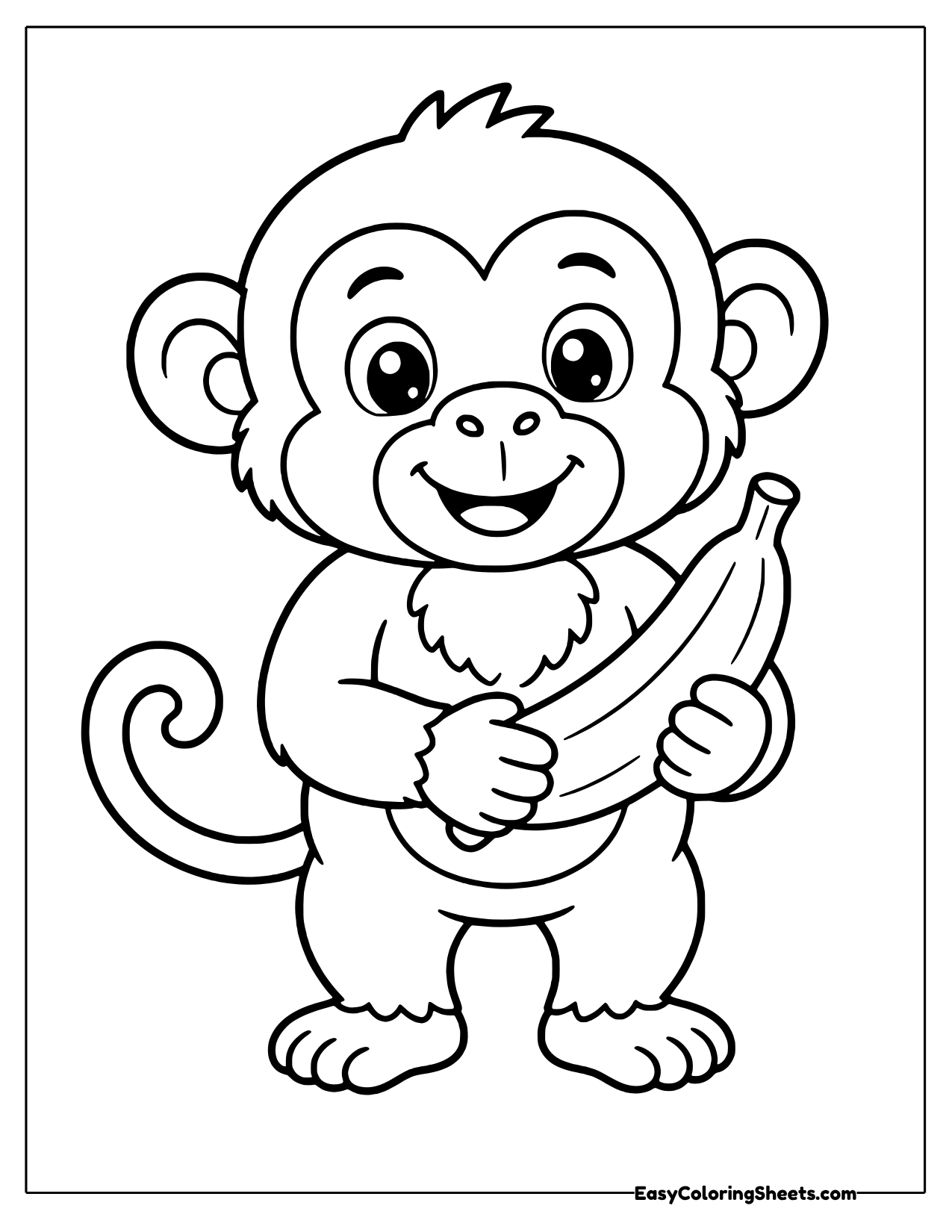 Monkey holding a banana with both hands