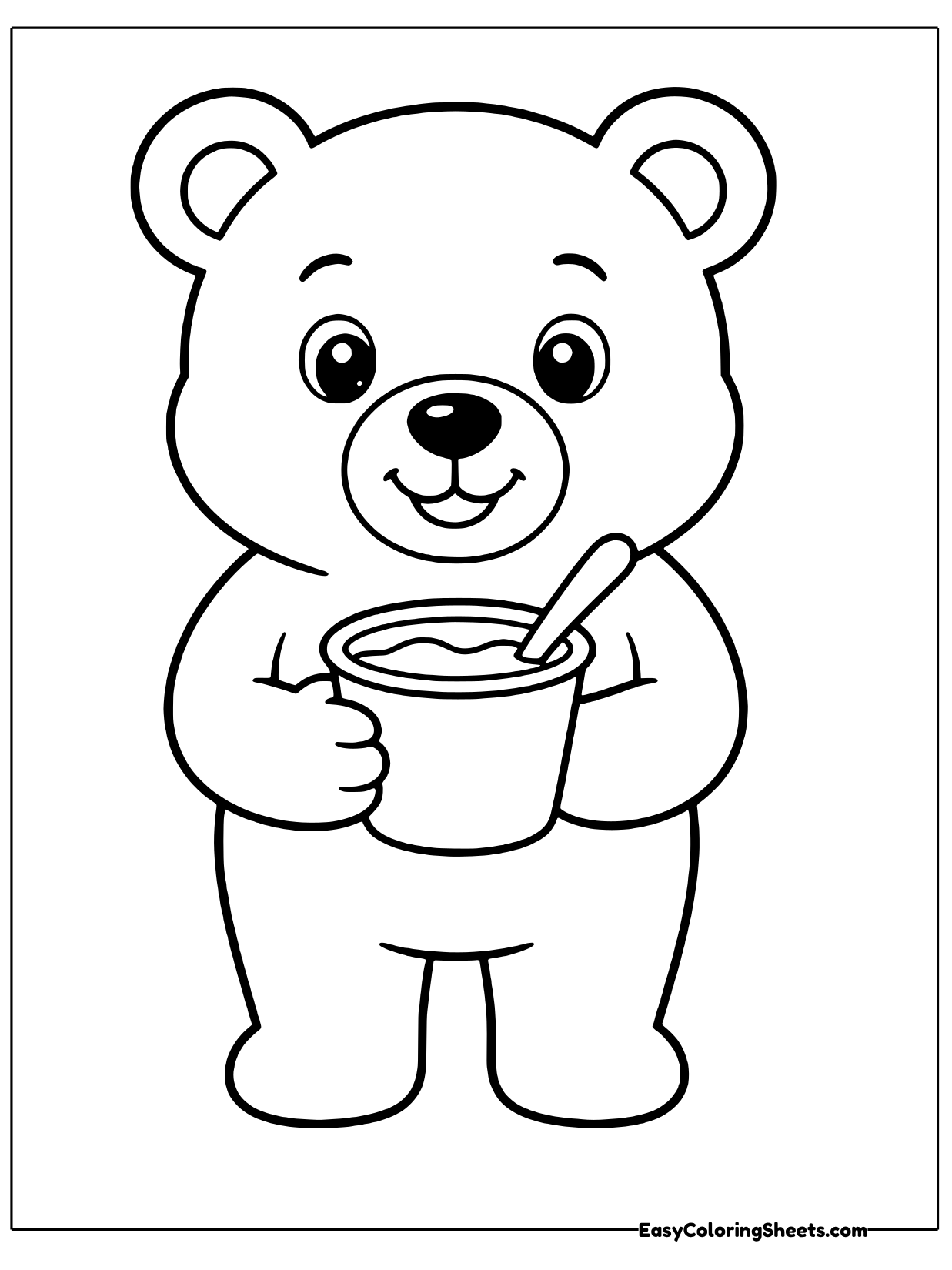 A smiling bear cub holds a little cup of yogurt with a spoon tucked inside, ready for a tasty snack.
