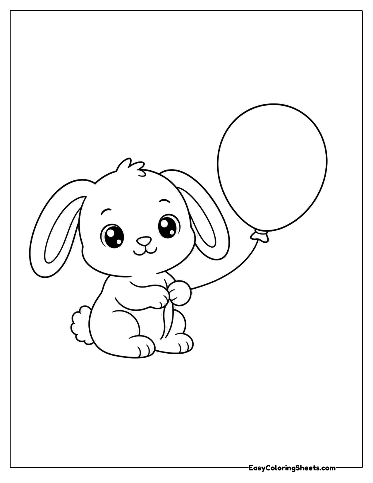 Lop-eared bunny holding a balloon string