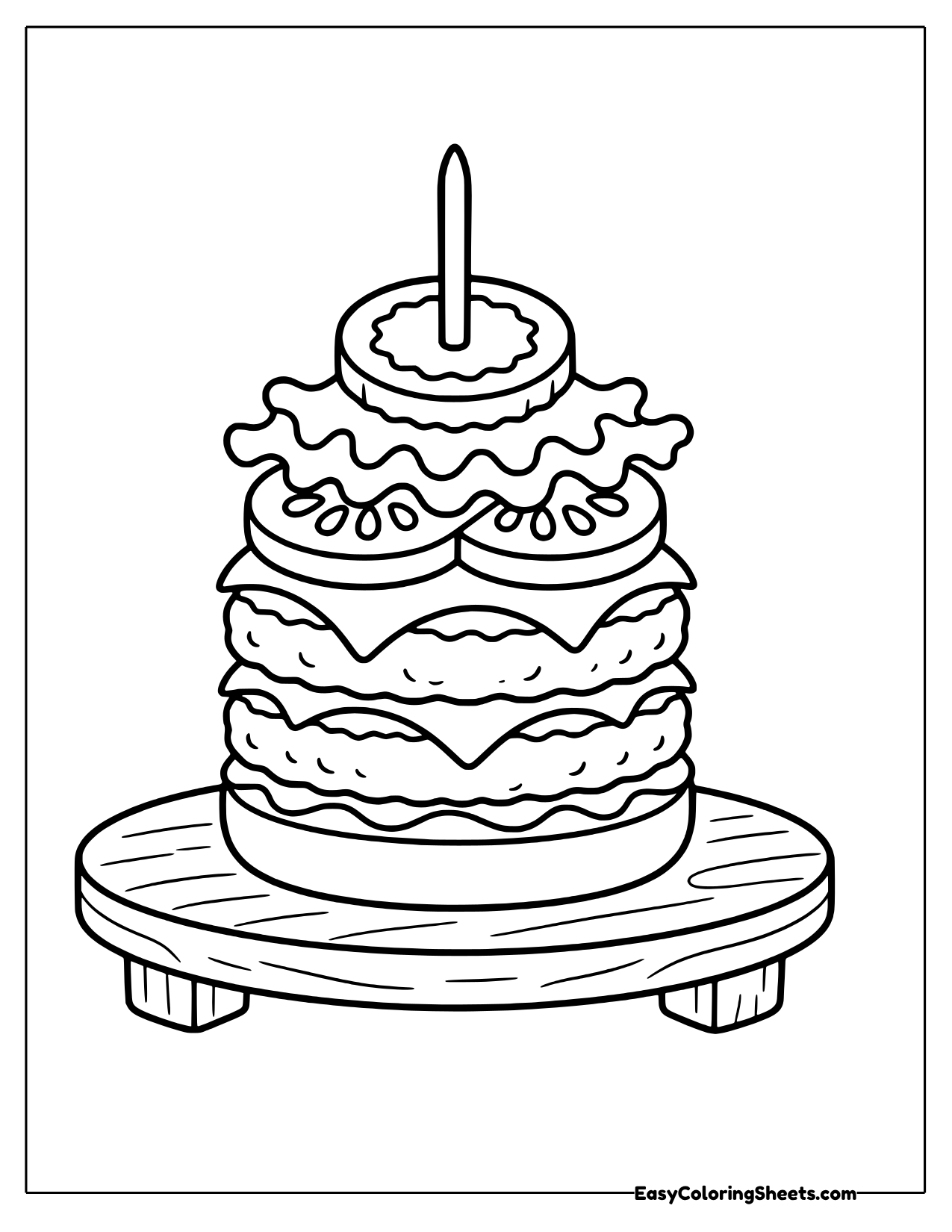 A tall stack of burger layers stands on a round wooden serving board, held together by a skewer with a topping on the end.