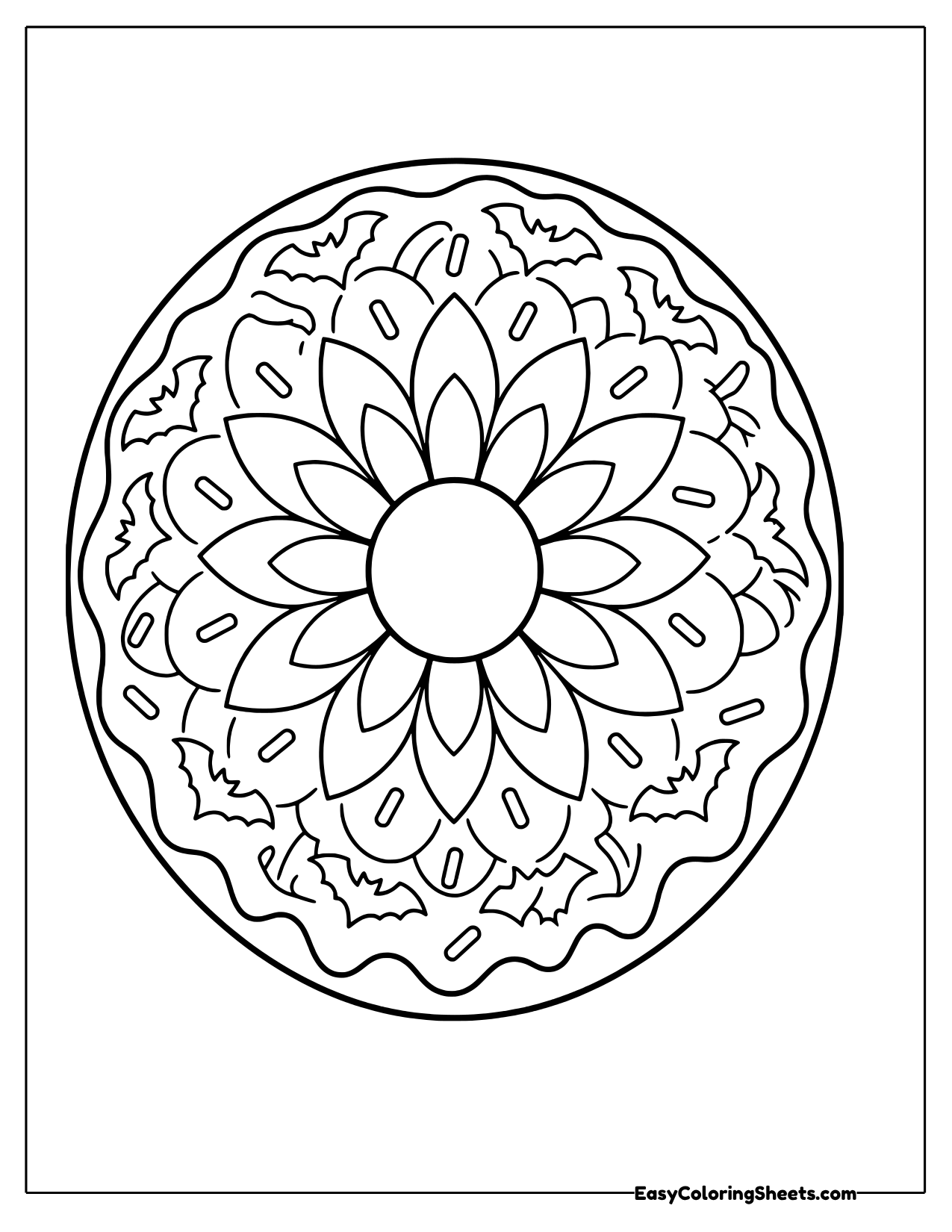 Round donut mandala with petal frosting, sprinkles and small bats