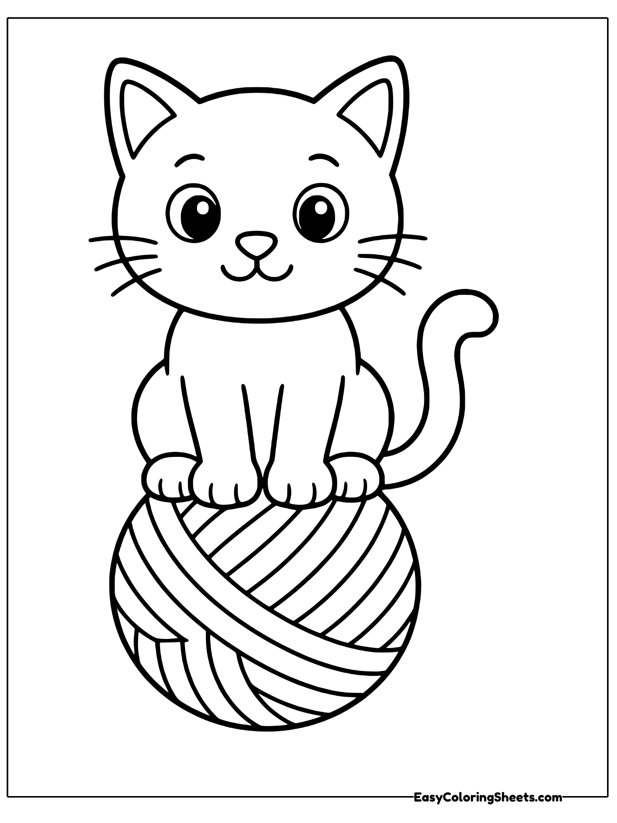A small kitten perches proudly on a giant ball of yarn, its tail curling down the side.