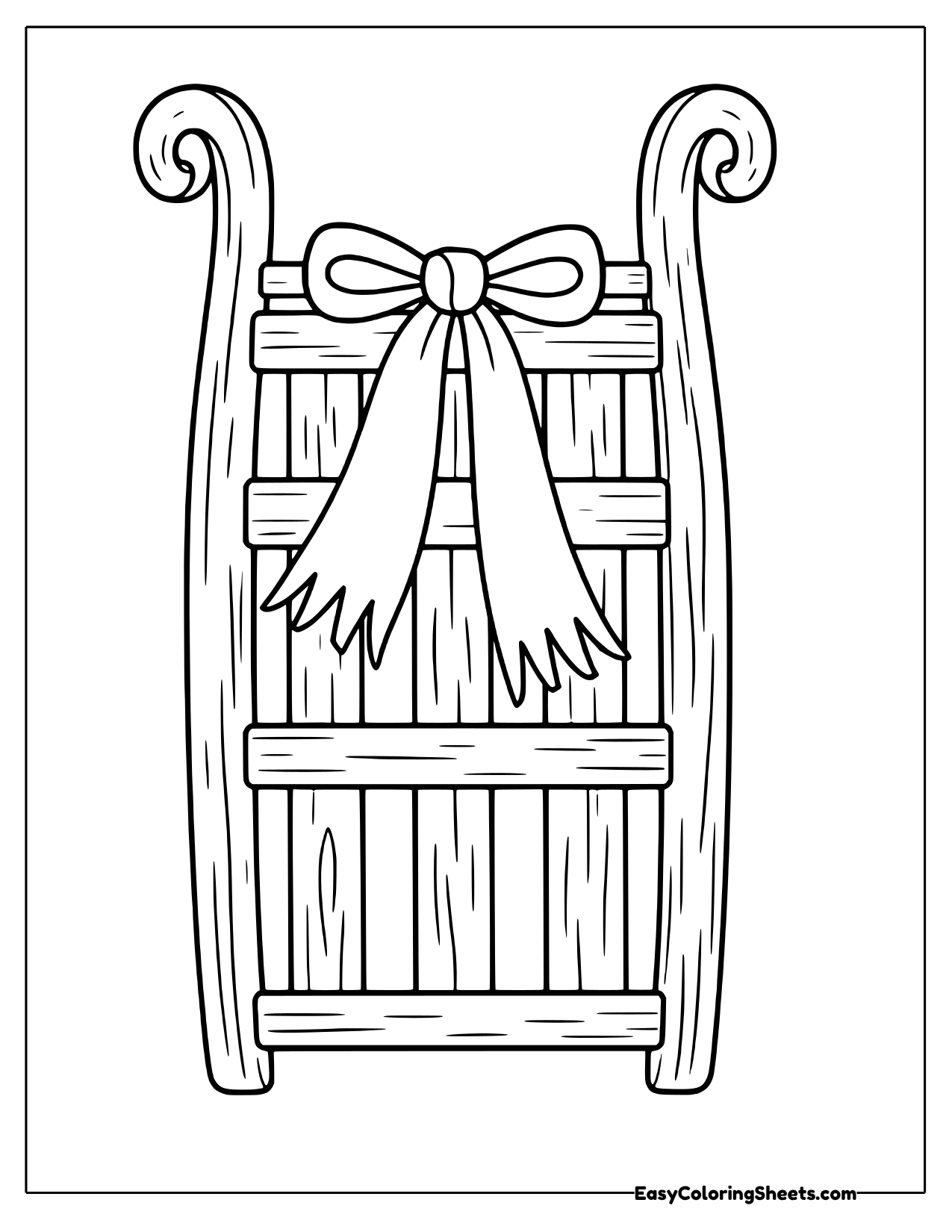 Upright wooden sled tied with a big ribbon bow