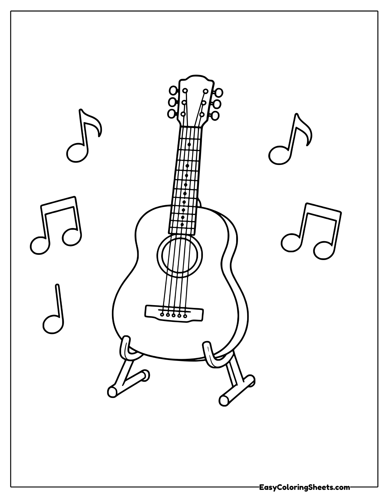 Acoustic guitar on a stand with music notes