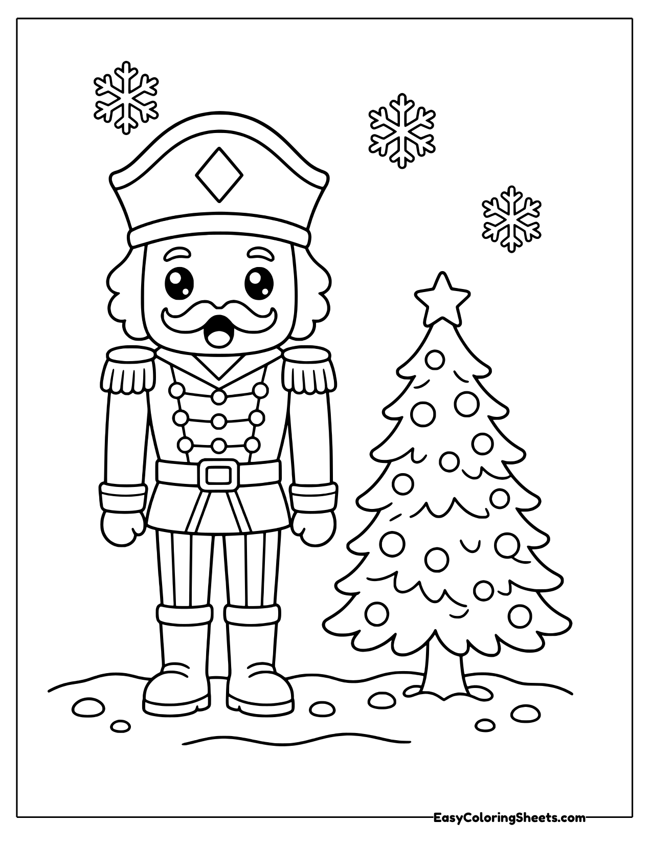Nutcracker soldier standing beside a small decorated Christmas tree