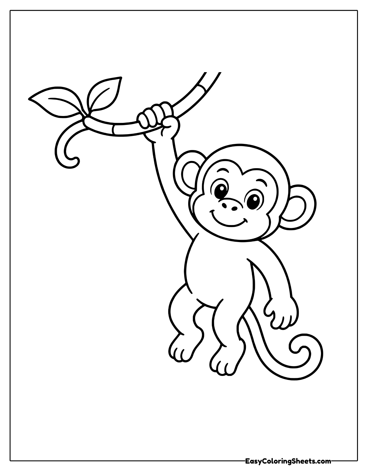 Monkey hanging from a vine