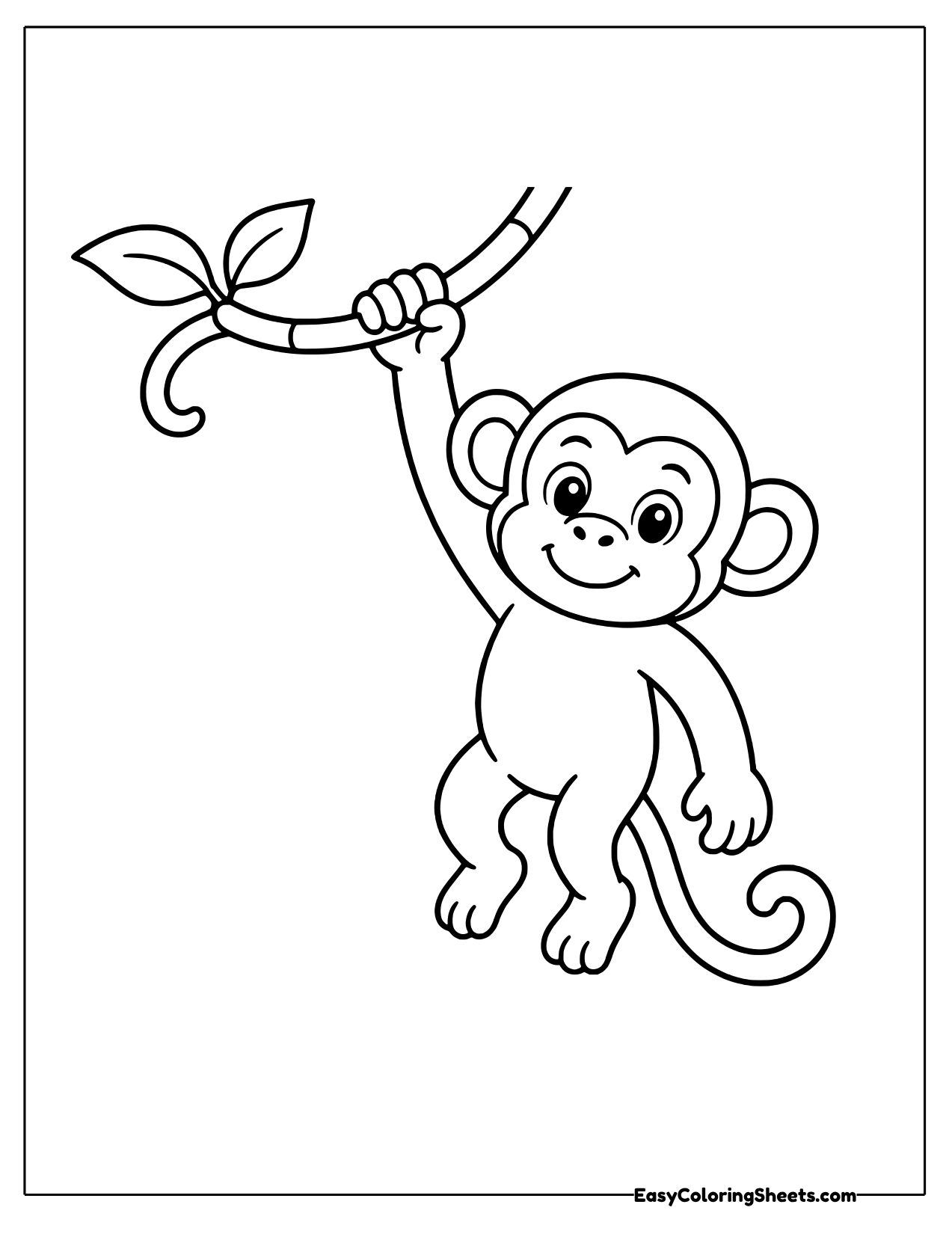 Monkey hanging from a vine