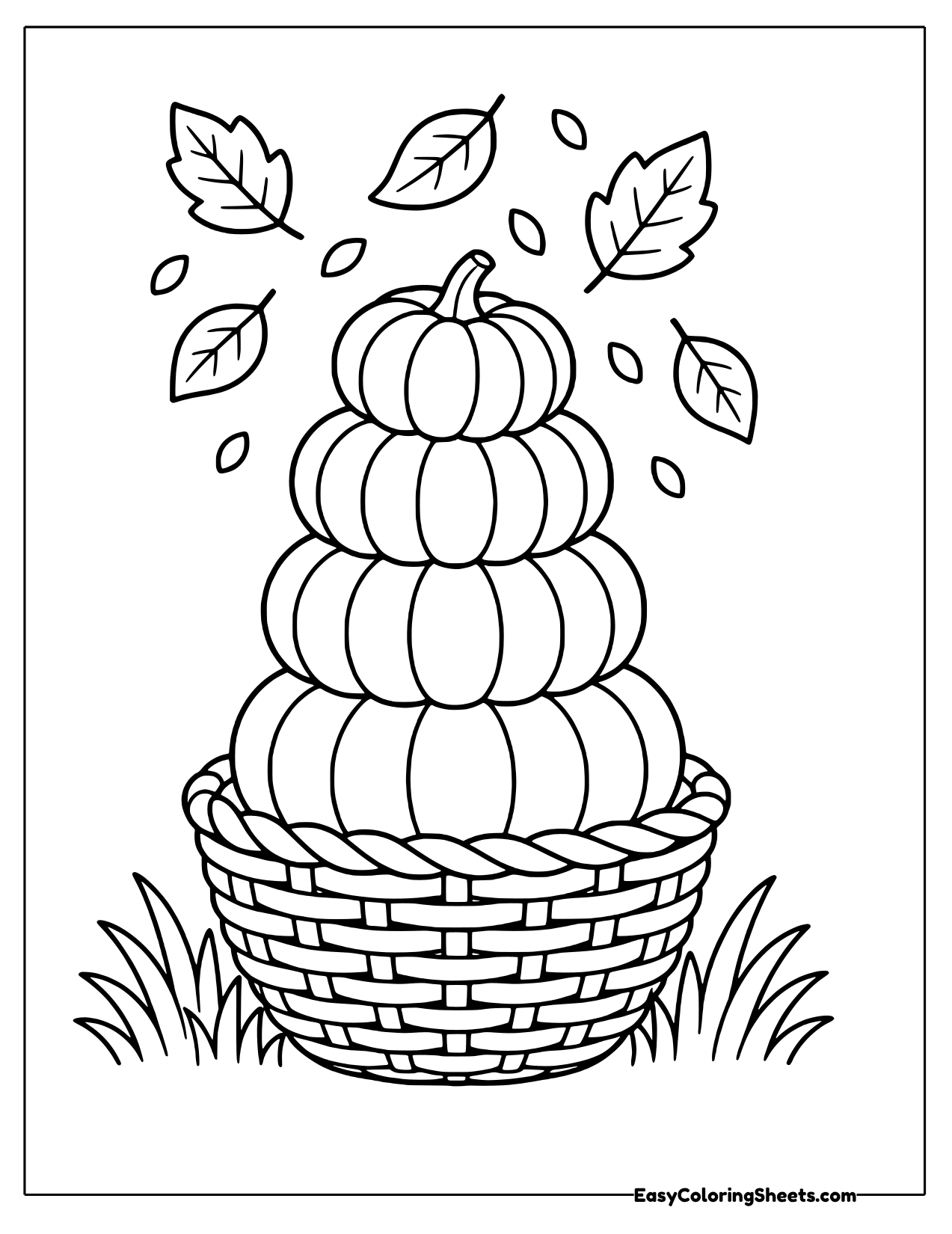Basket with a tower of stacked pumpkins