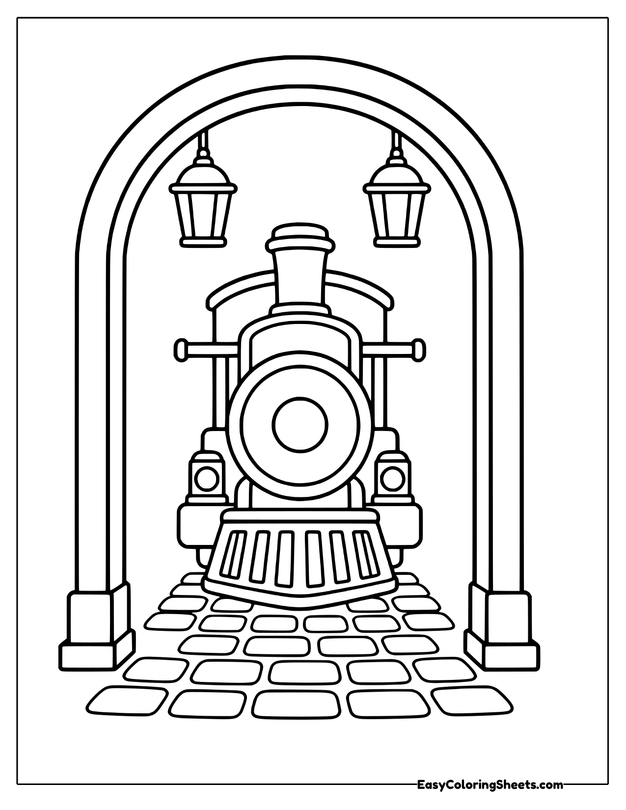 Steam engine facing forward inside a roundhouse