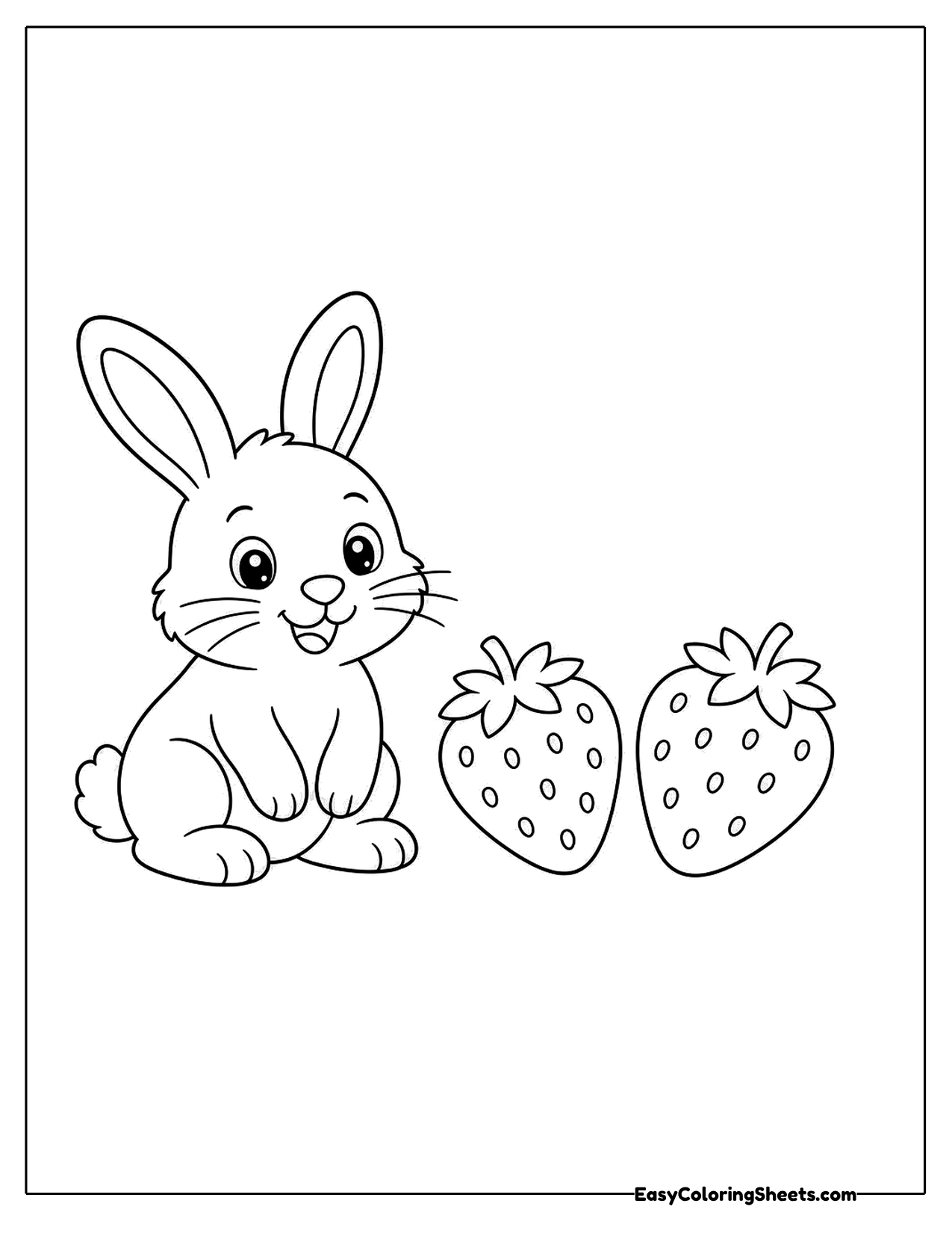 Bunny sitting beside two big strawberries