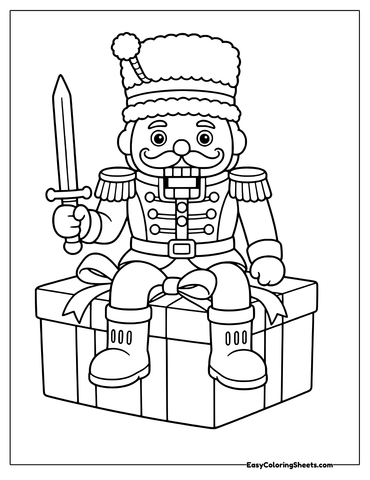 Nutcracker sitting on top of a gift box