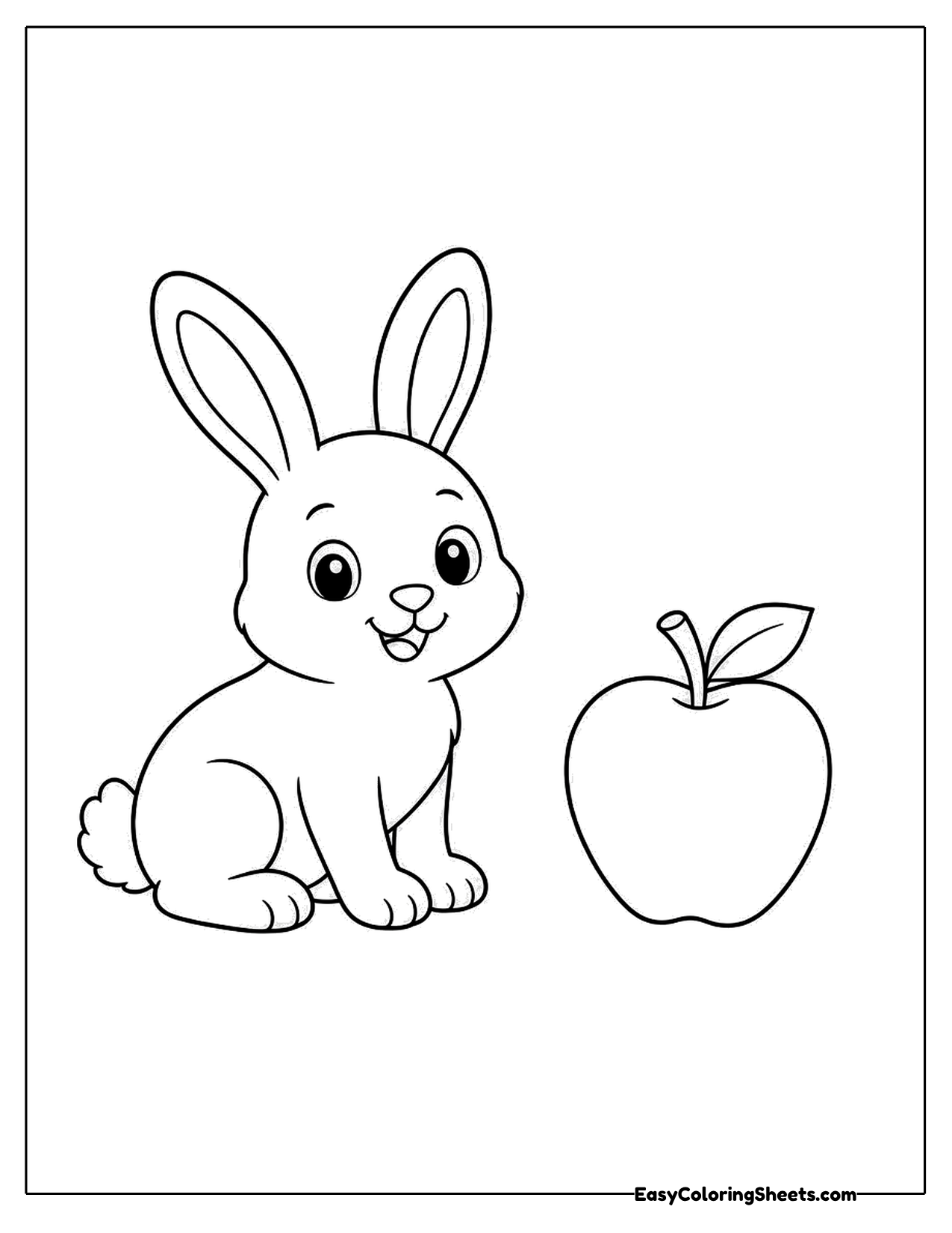 Bunny sitting next to a red apple with a leaf