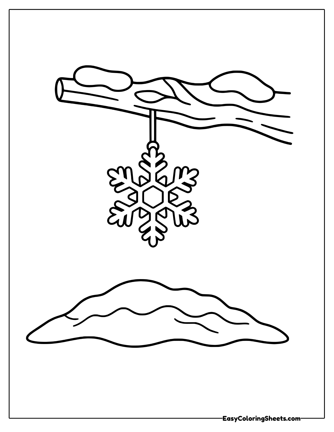 Snowflake hanging from a snowy tree branch