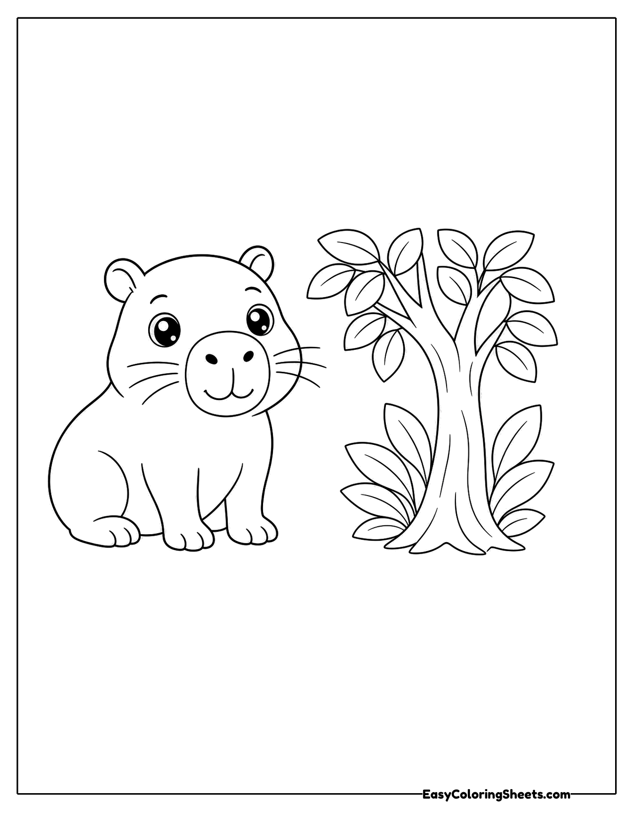 Capybara sitting beside a leafy bush