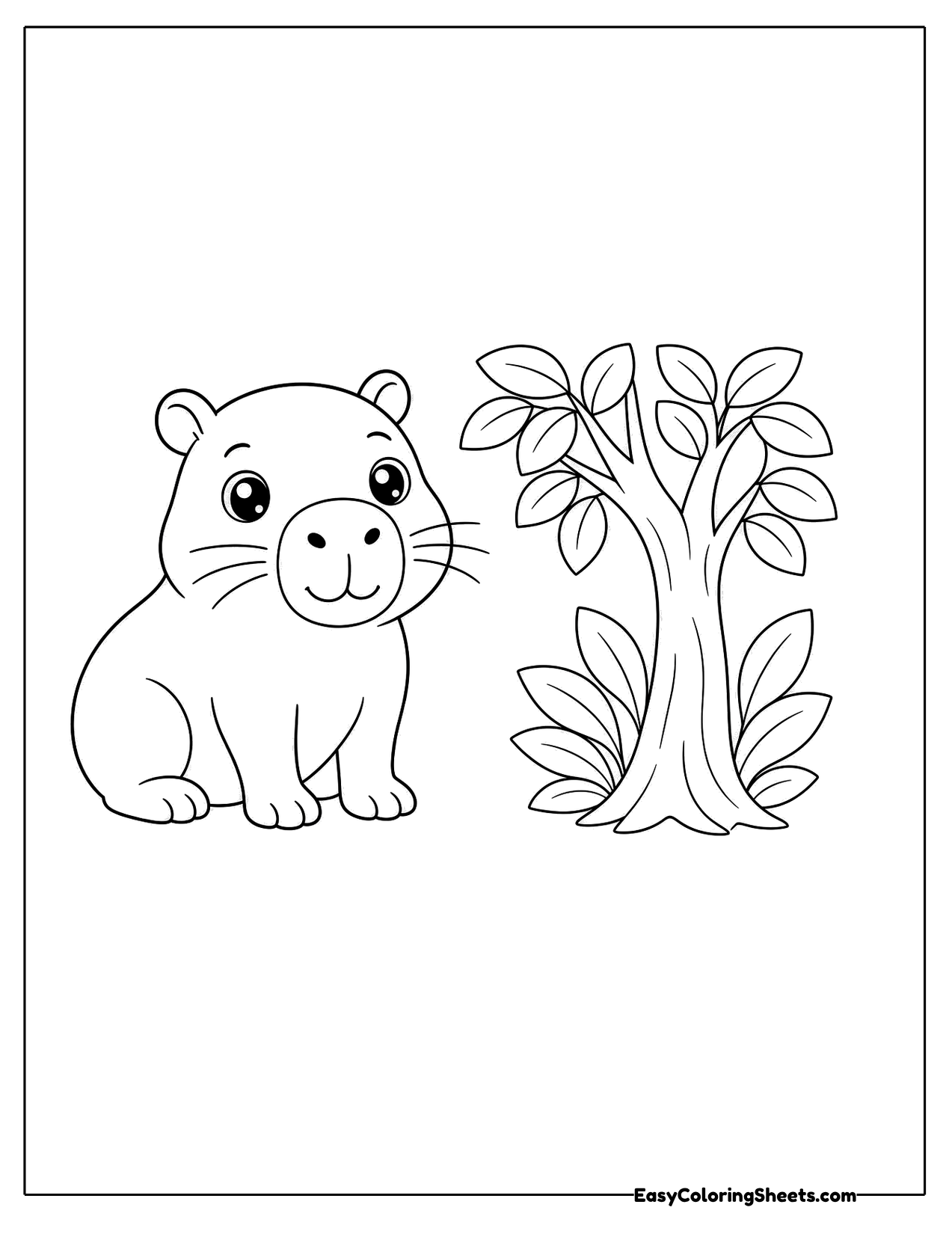 Capybara sitting beside a leafy bush