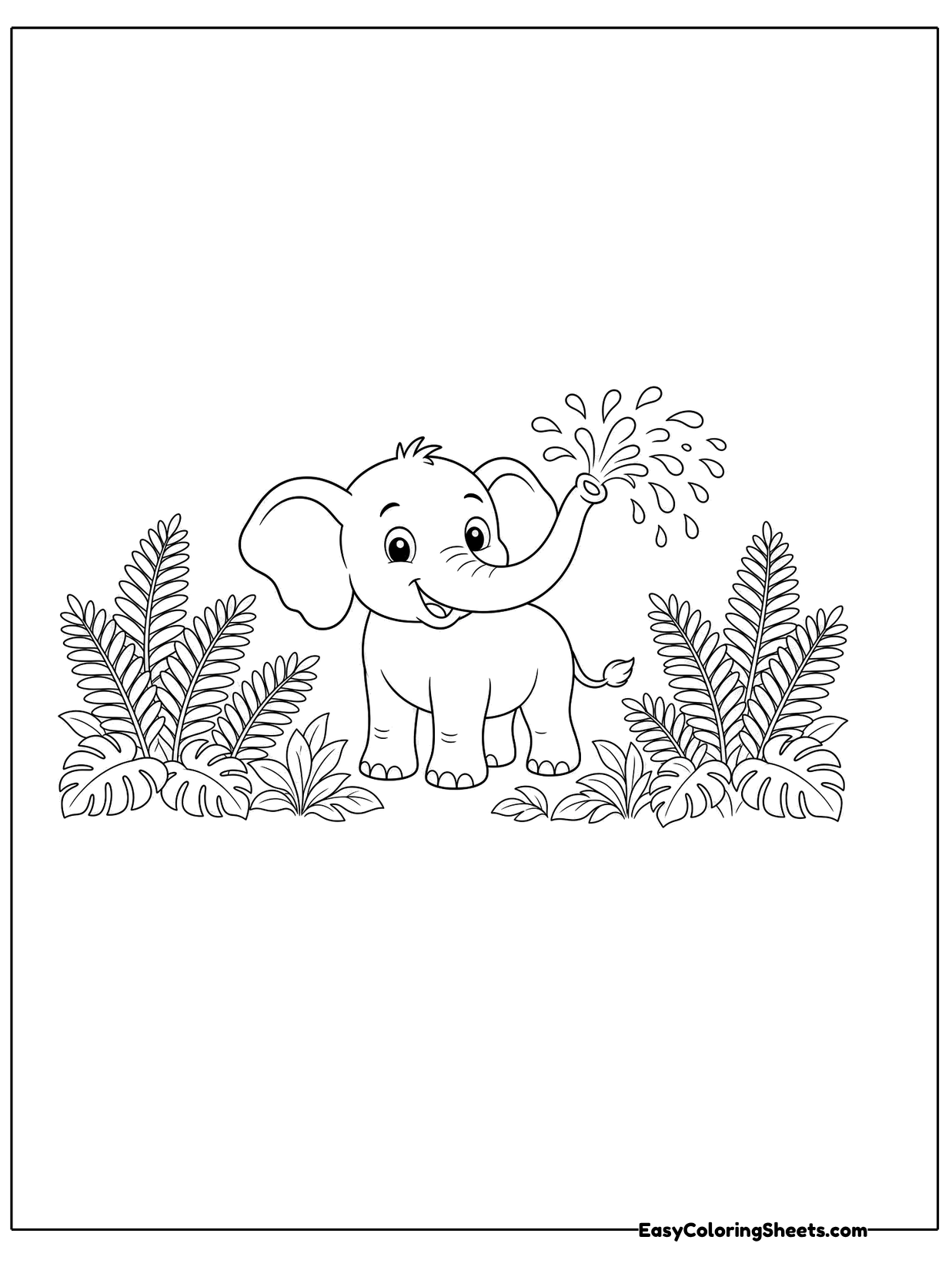 A small elephant lifts its trunk and sprays water into the air while standing between leafy jungle bushes.