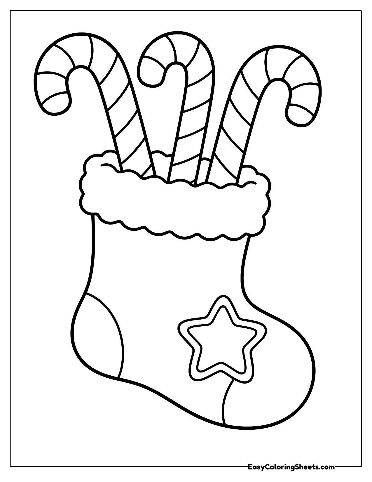 Three candy canes in a Christmas stocking with a star