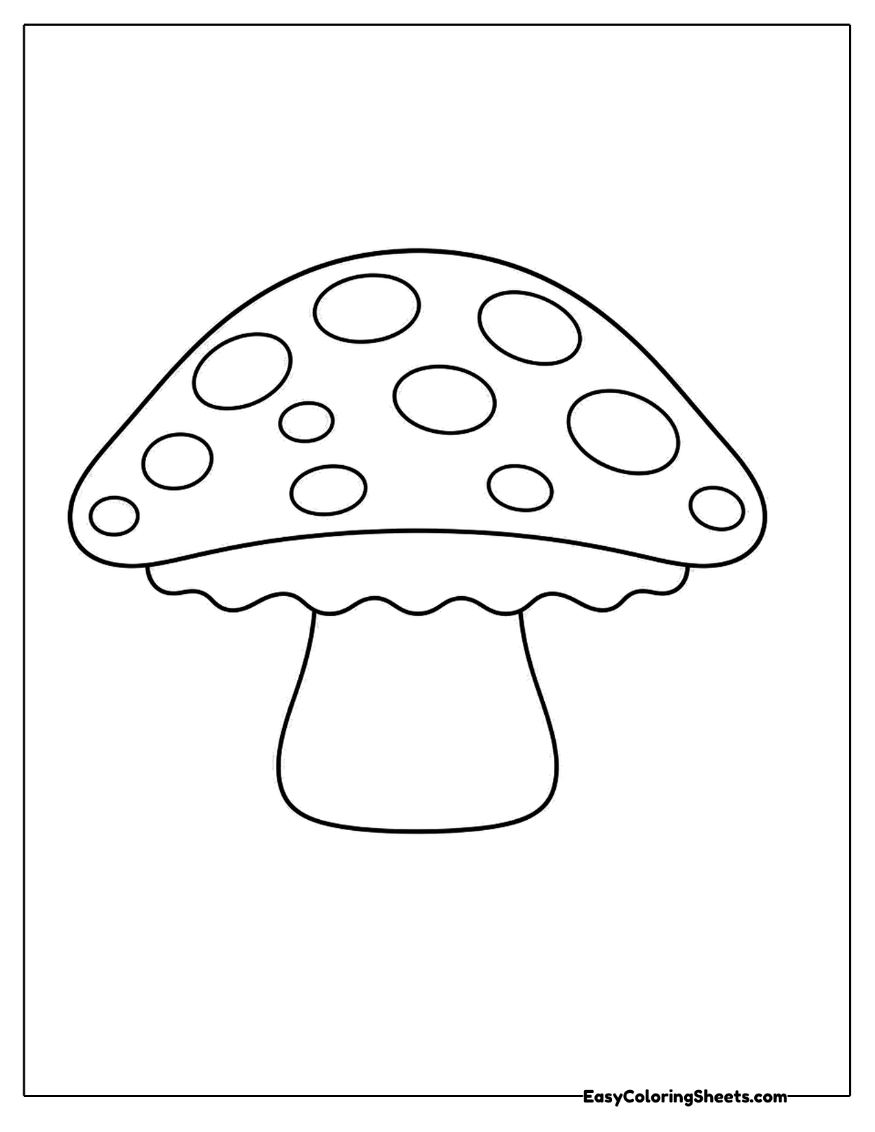 Cute toadstool with a spotted cap