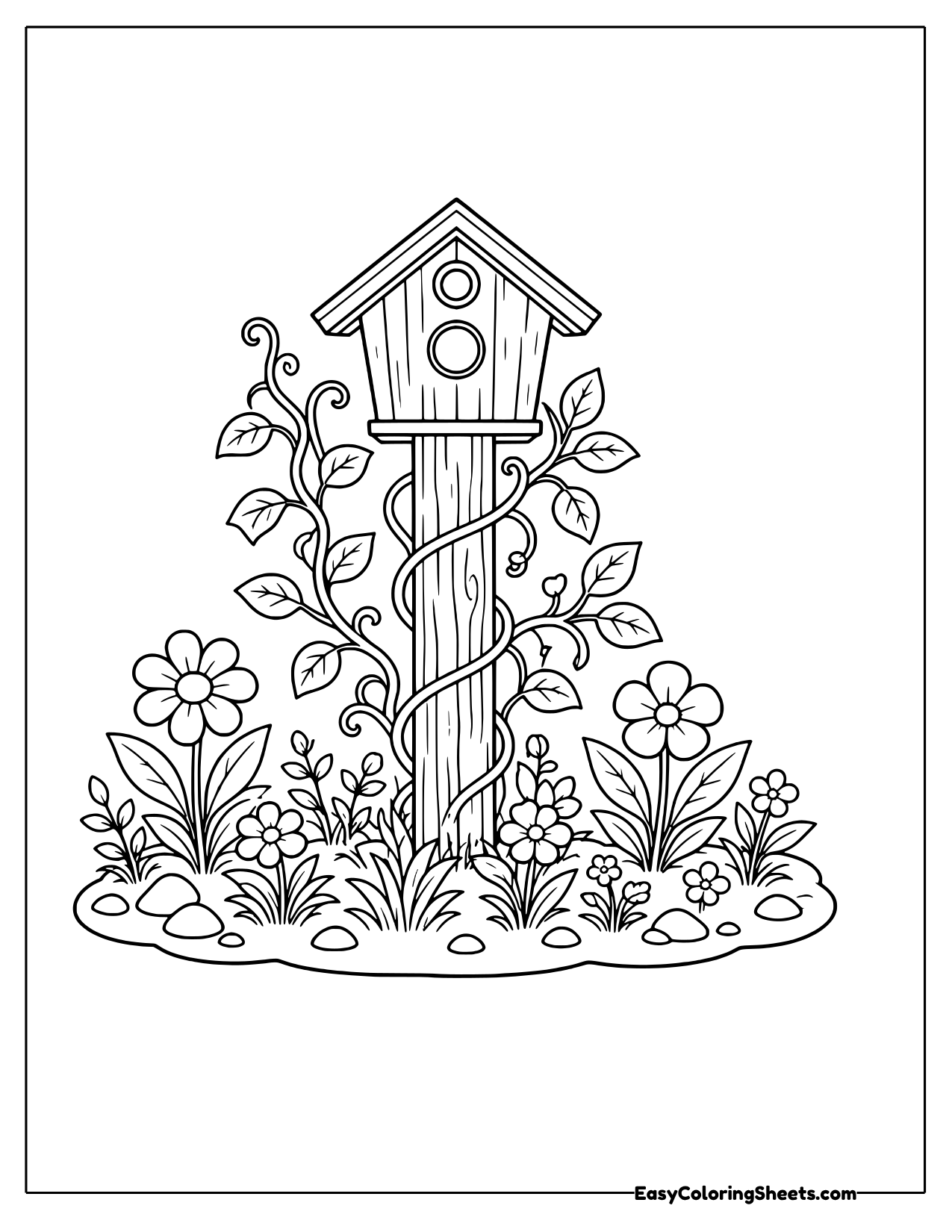 Birdhouse on a tall post wrapped in flowering vines