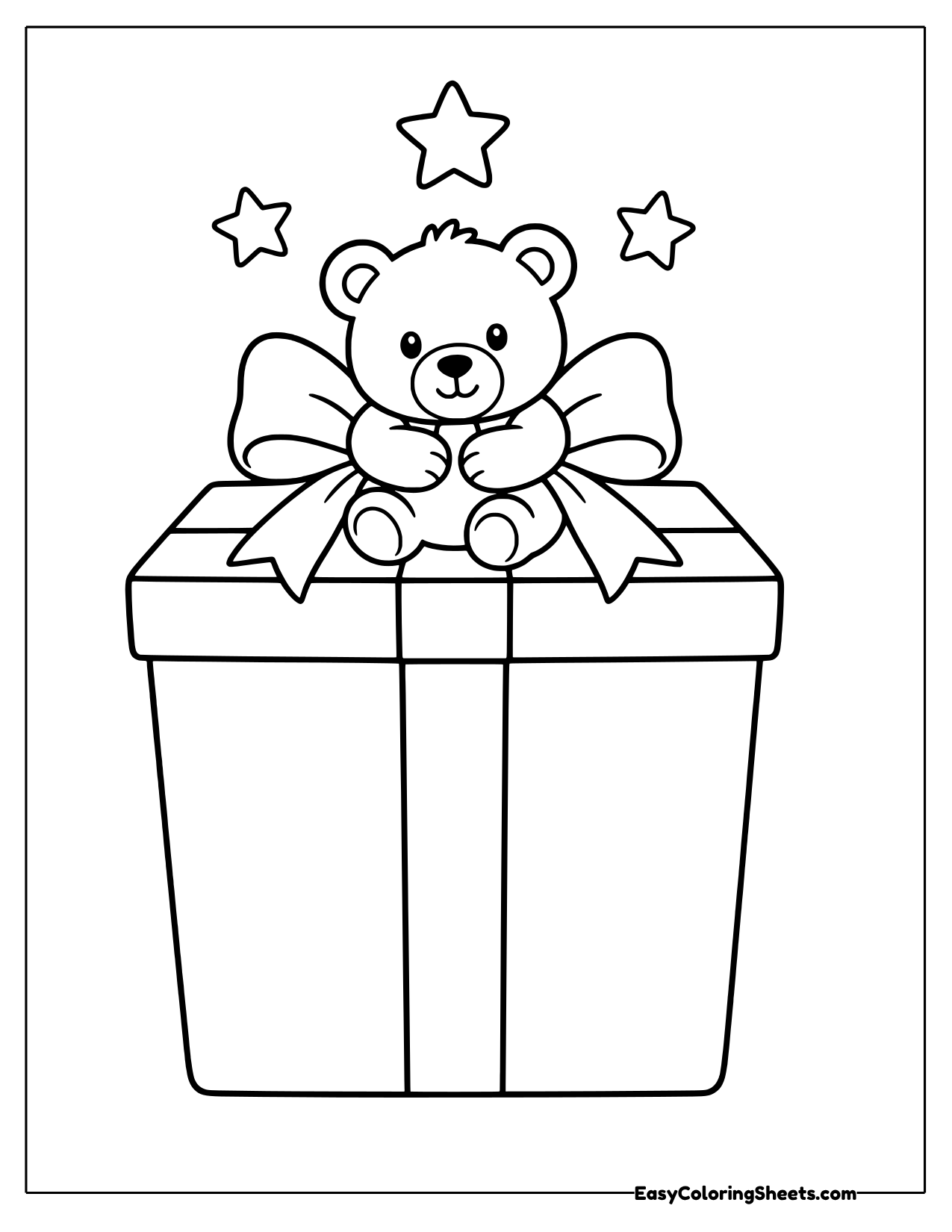 Teddy bear sitting on top of a wrapped Christmas present