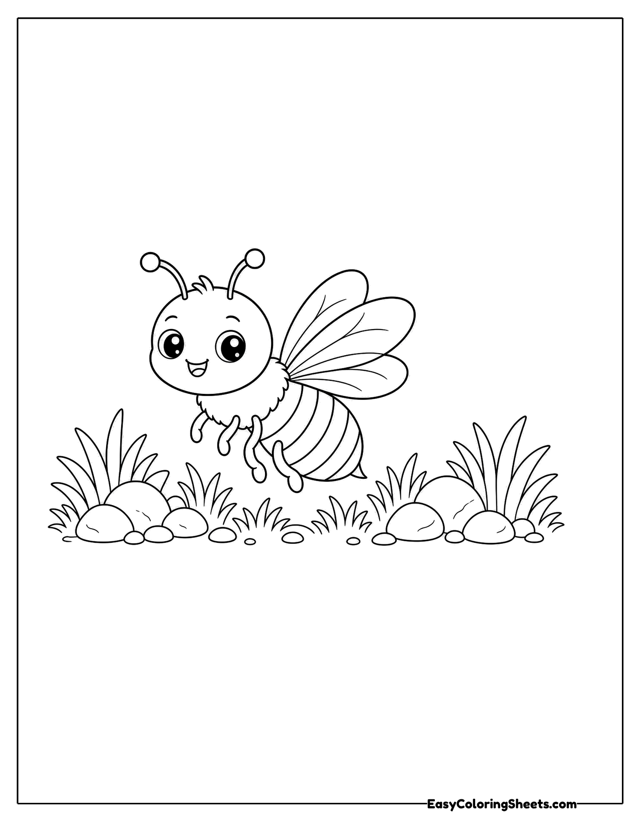 Bee flying over a patch of grass