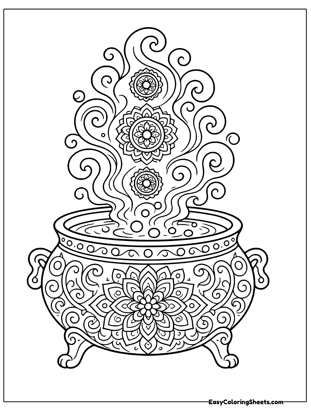 A round witch's cauldron stands on three curled feet, its belly wrapped in a big flower mandala.