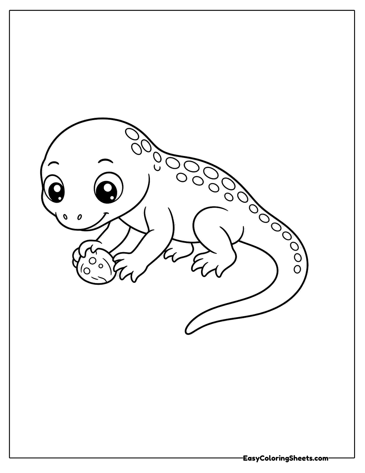 Lizard holding a small round pebble