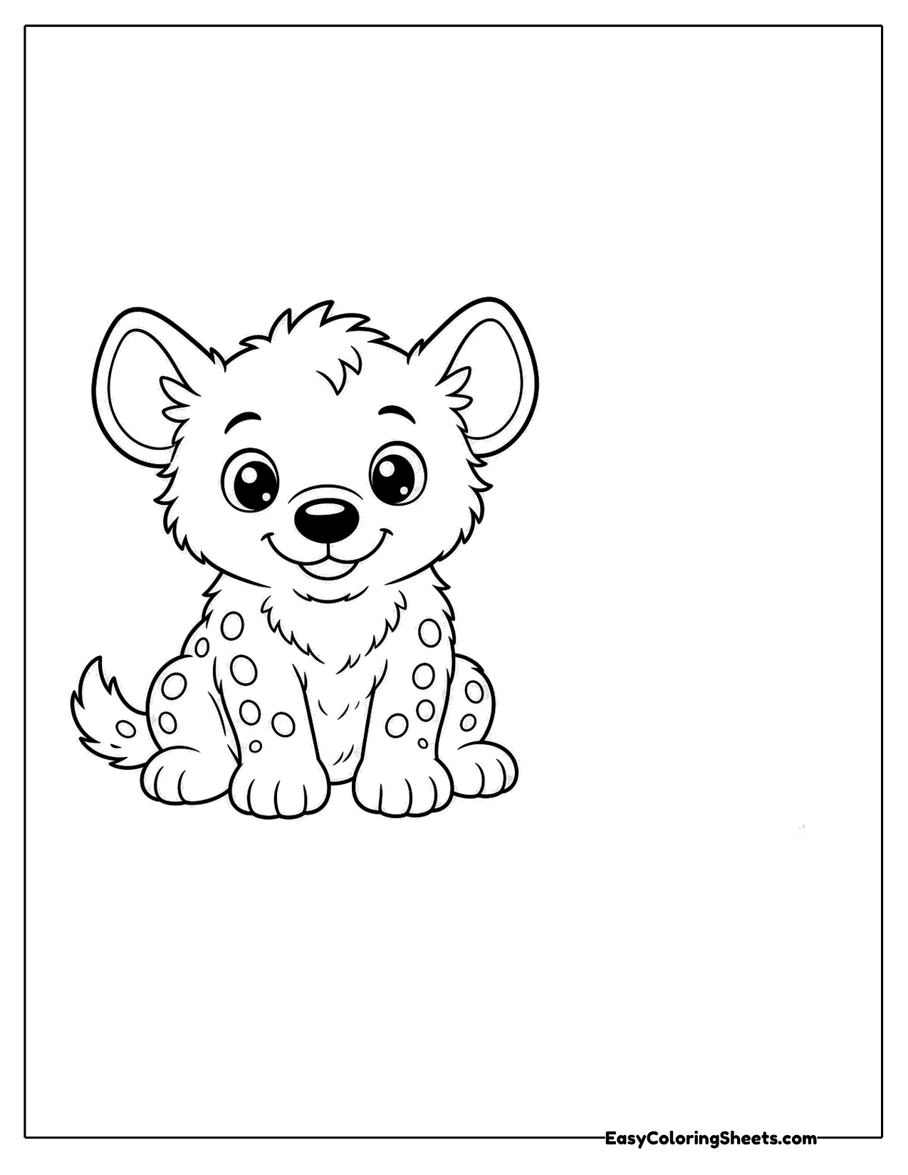 Small spotted hyena cub sitting