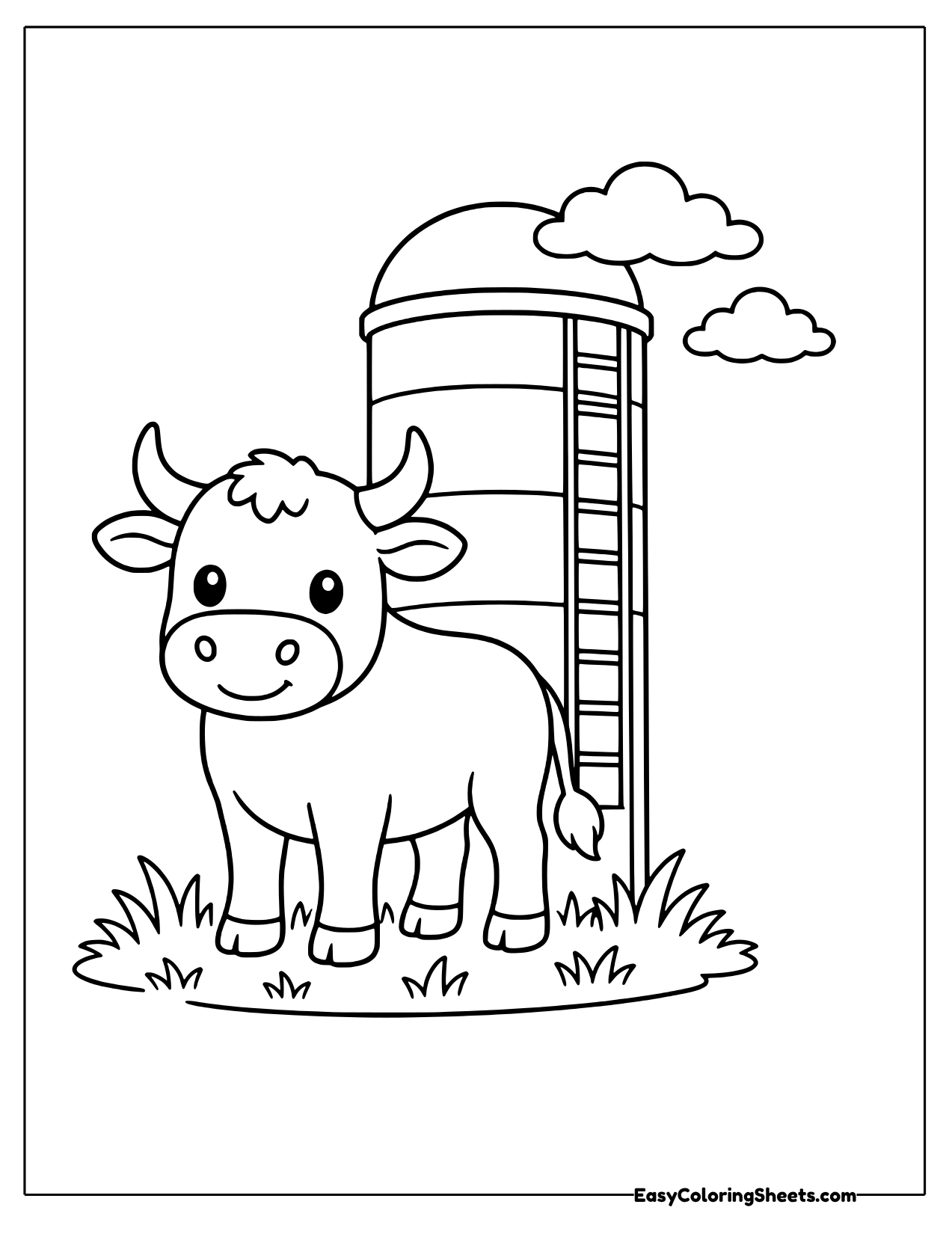Bull standing beside a barn silo