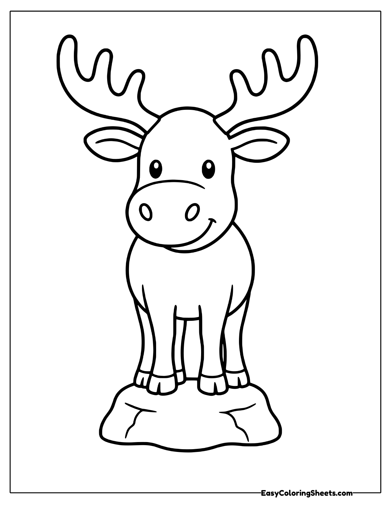 Moose standing on a small rock