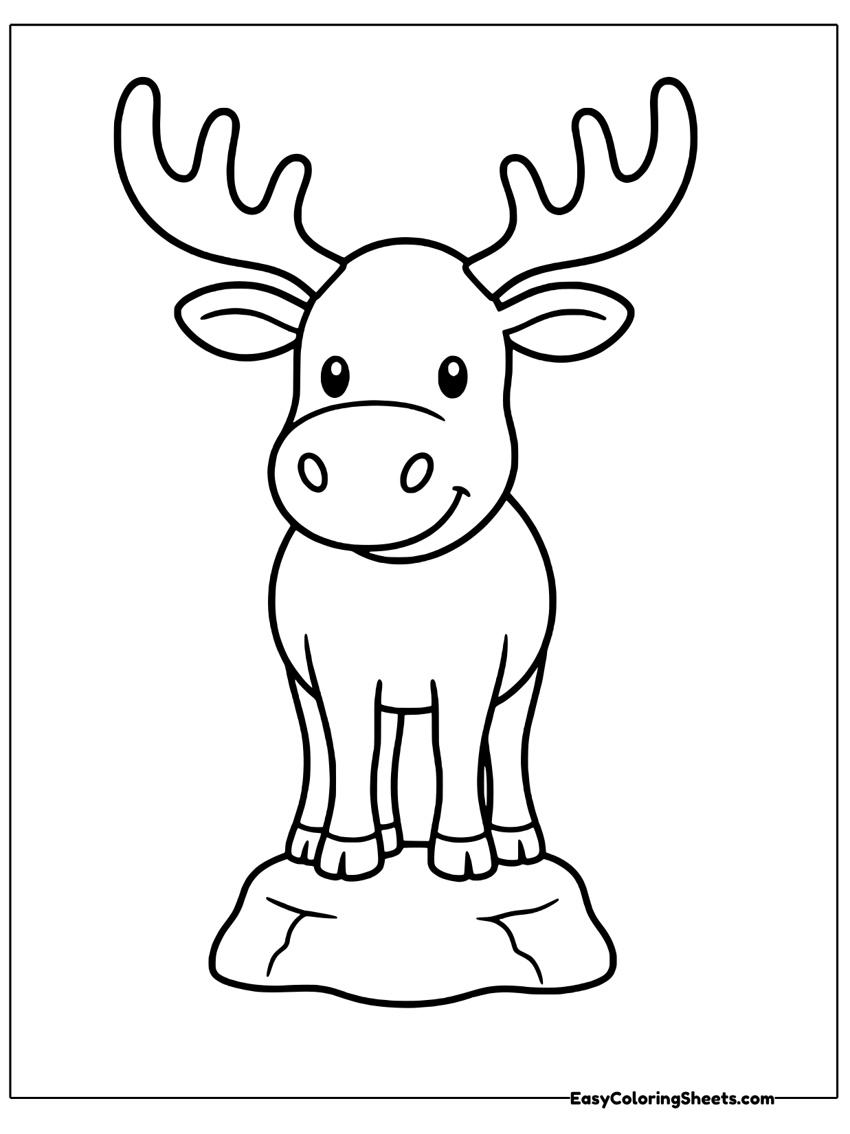 A moose stands squarely on a low rock with its front legs together and antlers spread wide.