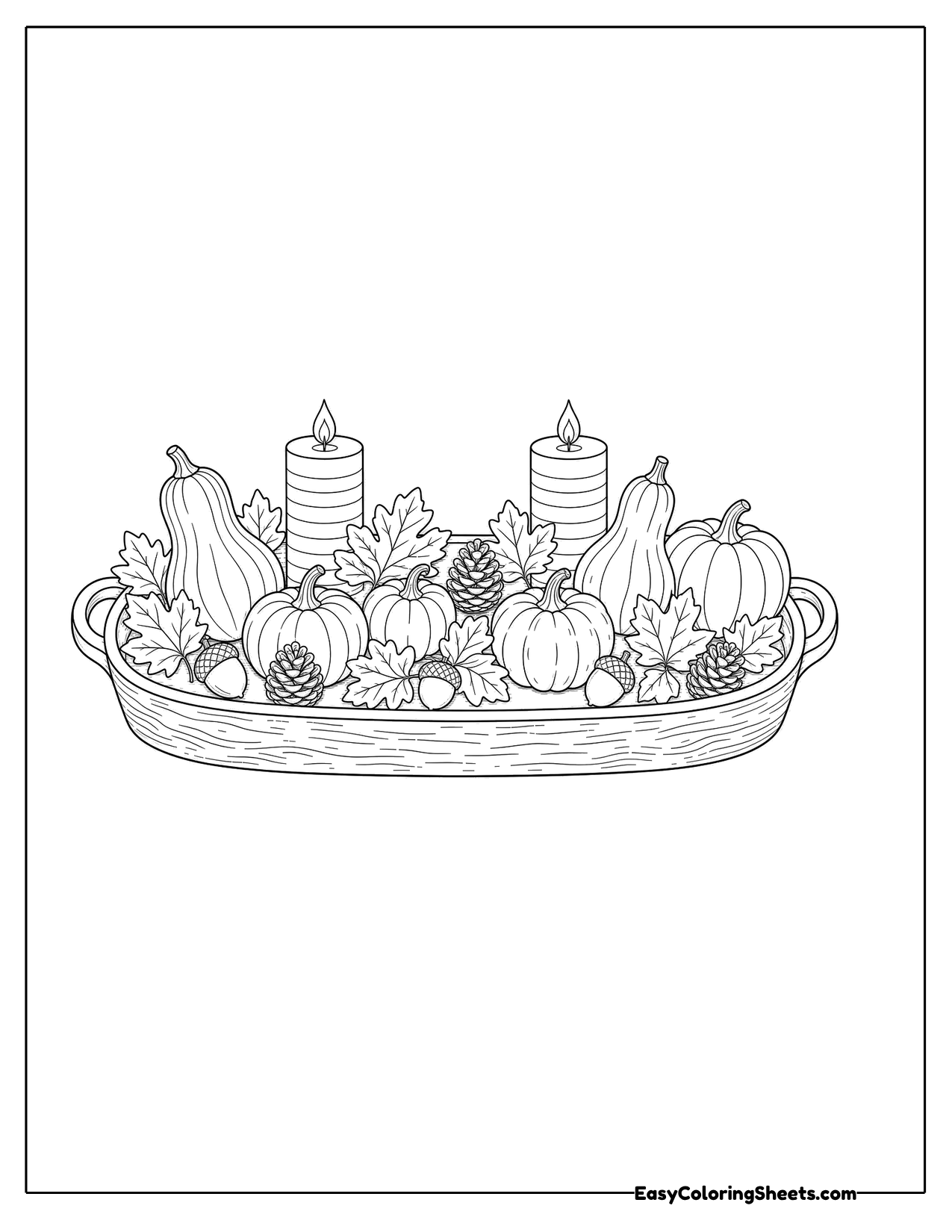 Long table centerpiece of pumpkins, gourds and candles