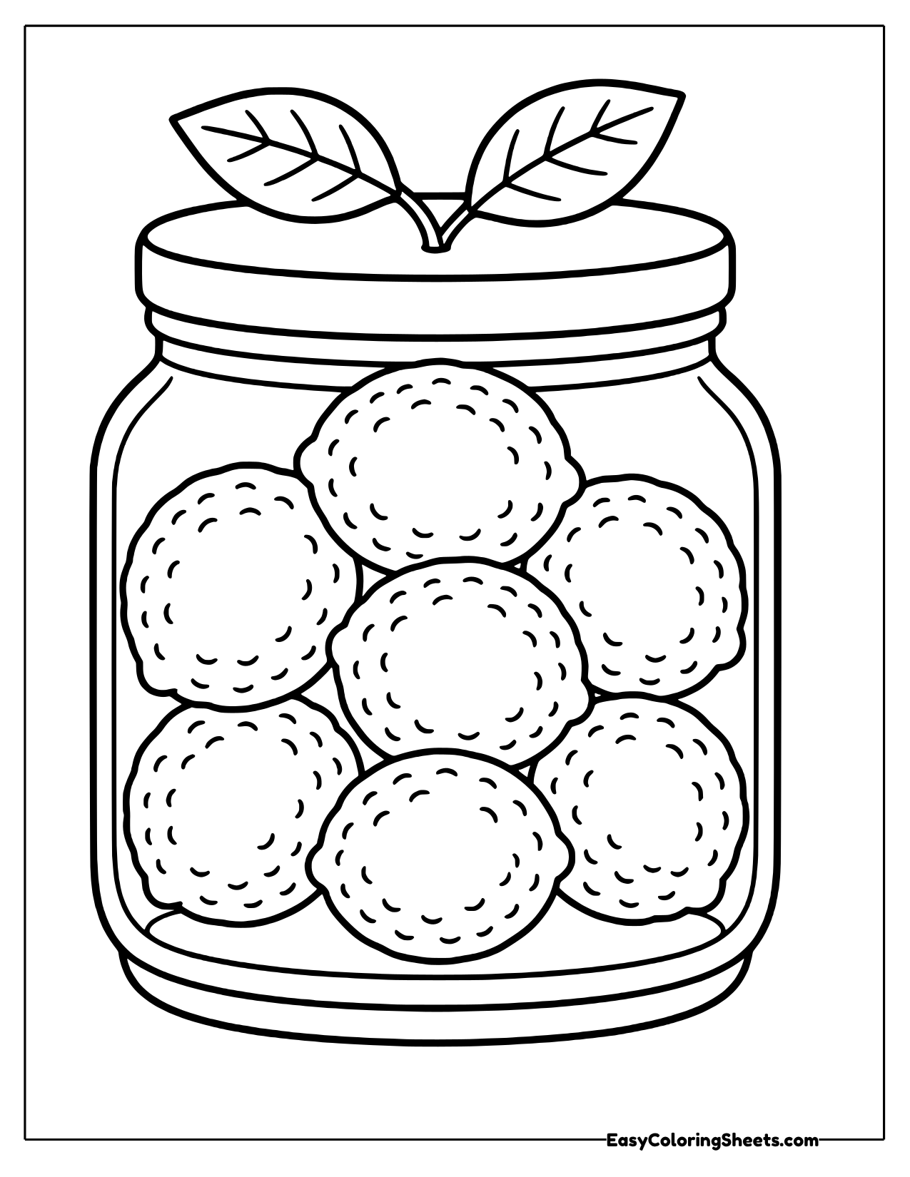 Short glass jar with a lid and leaves on top, filled with whole limes