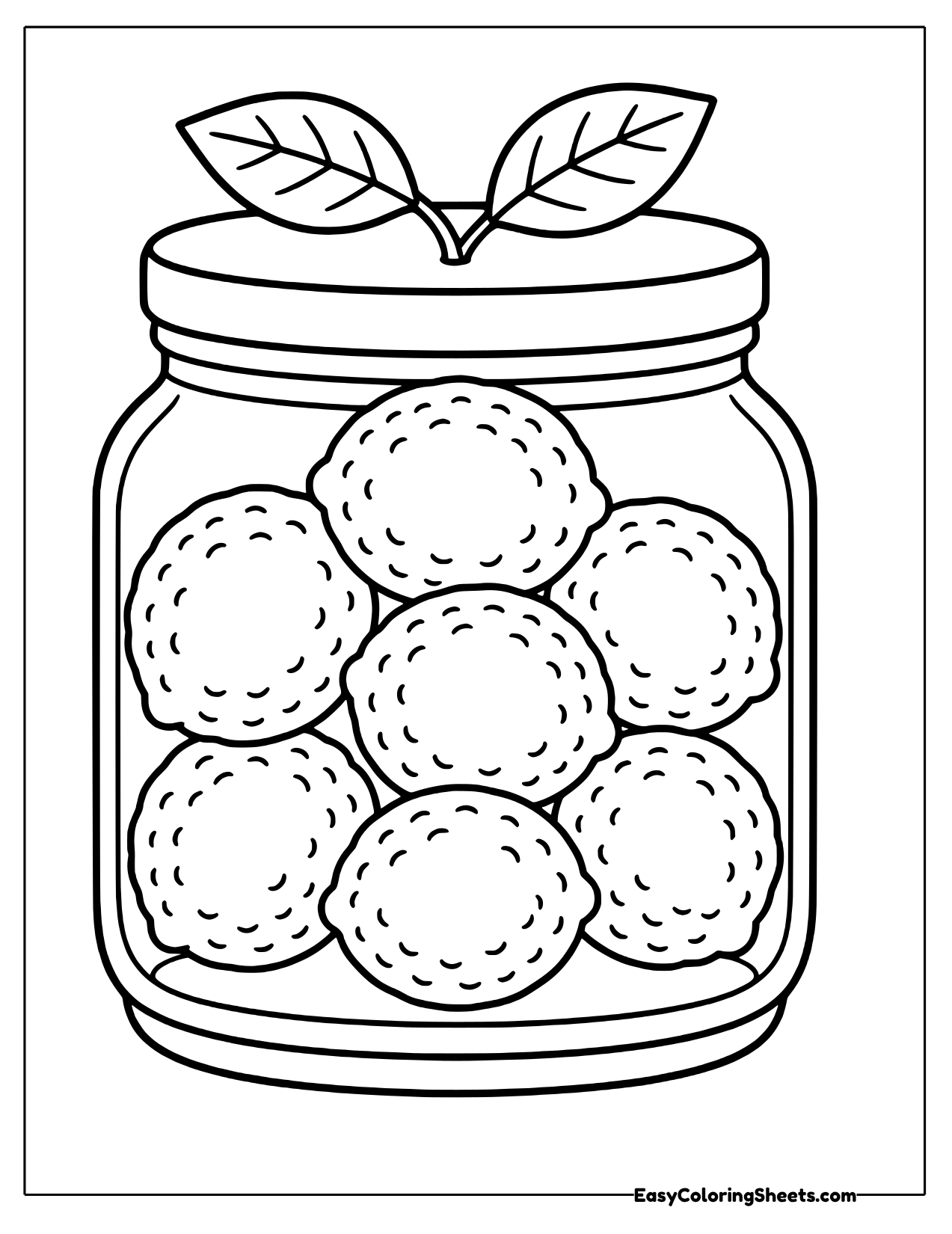 Short glass jar with a lid and leaves on top, filled with whole limes