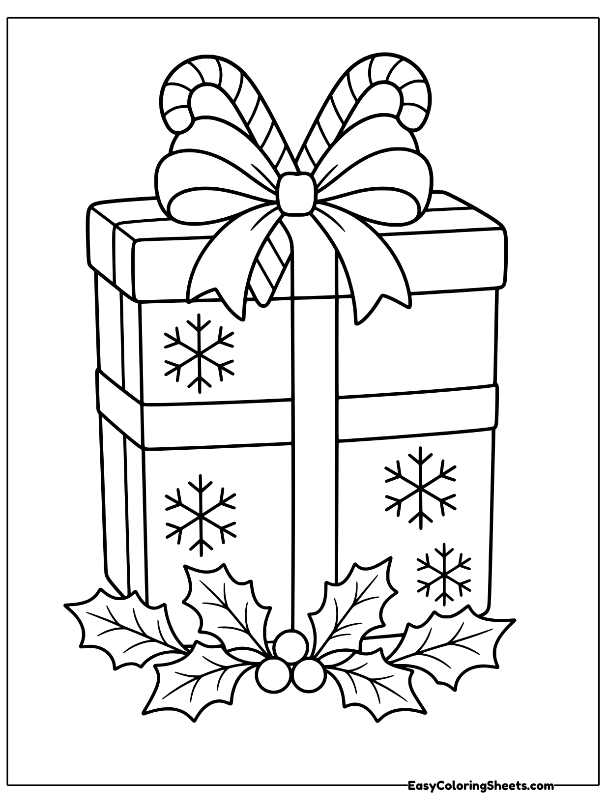 A tall Christmas present wrapped with snowflake paper has a big ribbon bow with two candy canes tucked in on top and holly.