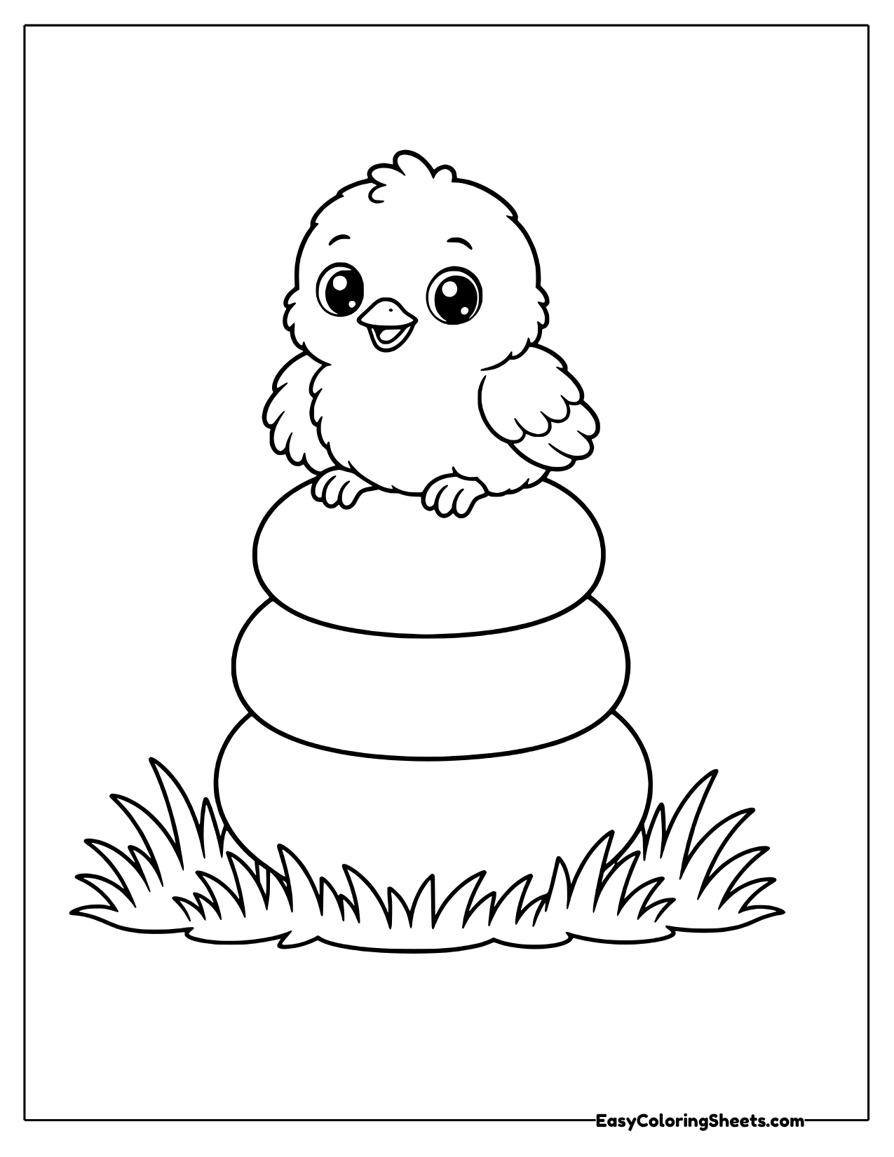 Chick sitting on three stacked balls