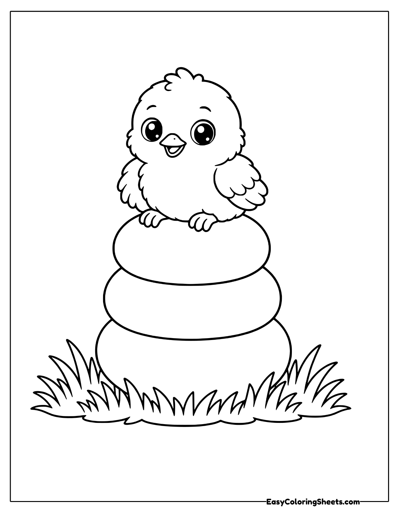 Chick sitting on three stacked balls