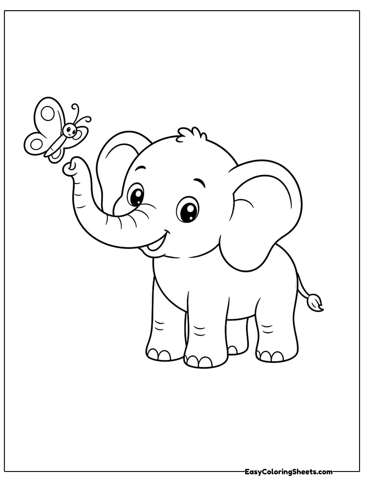 A cheerful elephant lifts its trunk to greet a butterfly fluttering in front of it.