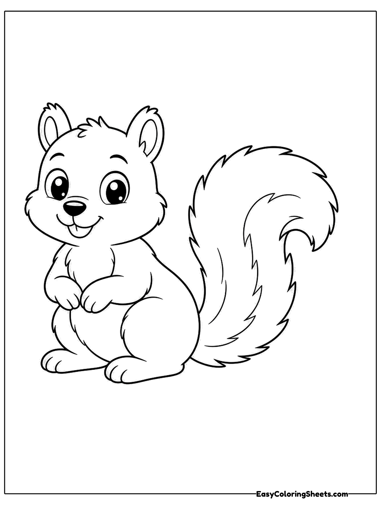 A sweet baby squirrel sits up on its hind legs with its paws held together and its big bushy tail curled behind.