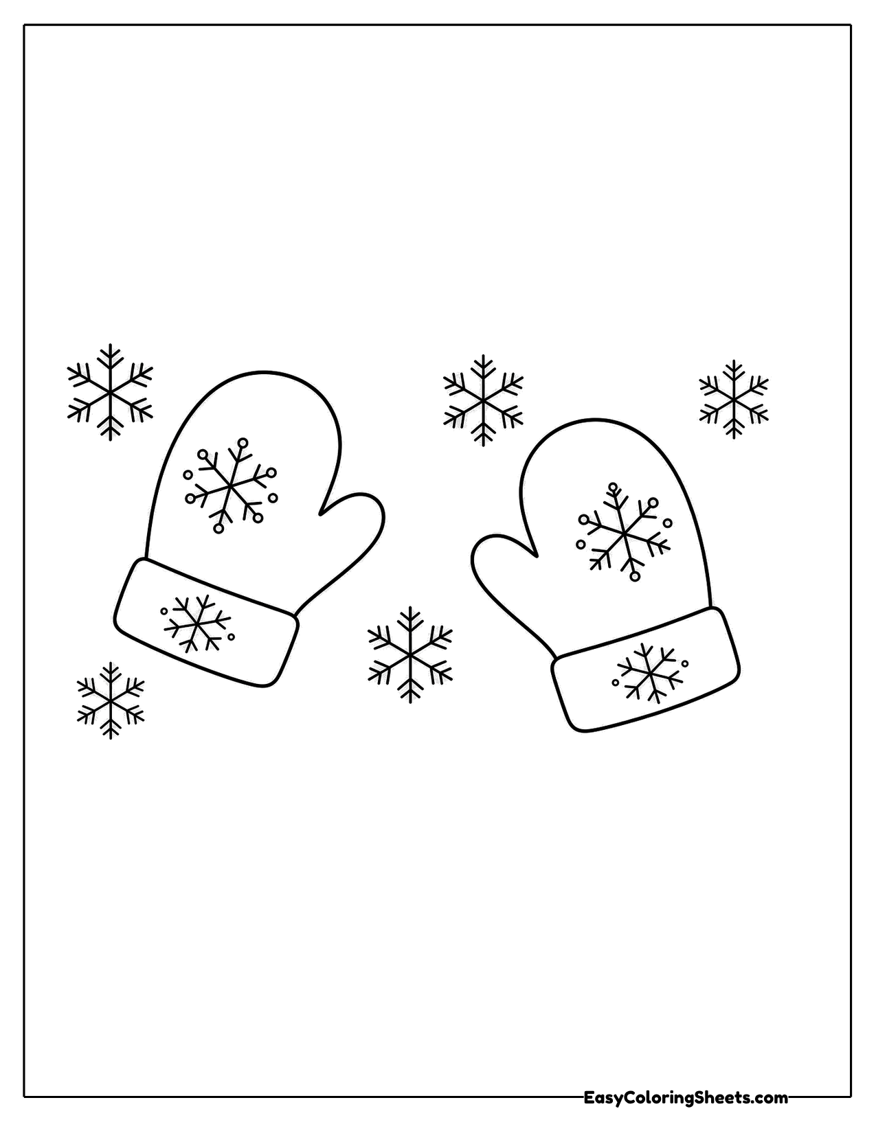 Small mittens surrounded by snowflakes